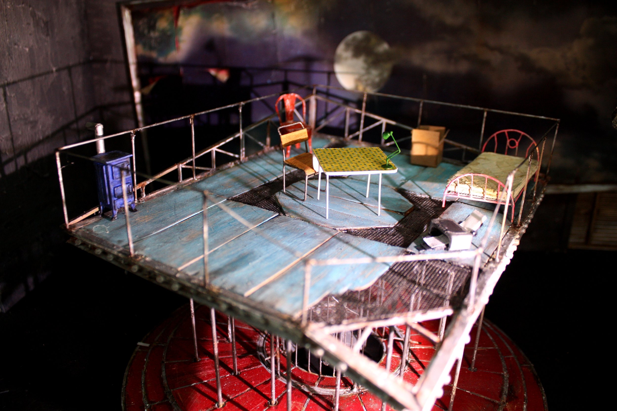 "La Boheme" Malmo Opera, Sweeden designed by Leslie Travers. Some of the metal work by Daniel Harvey