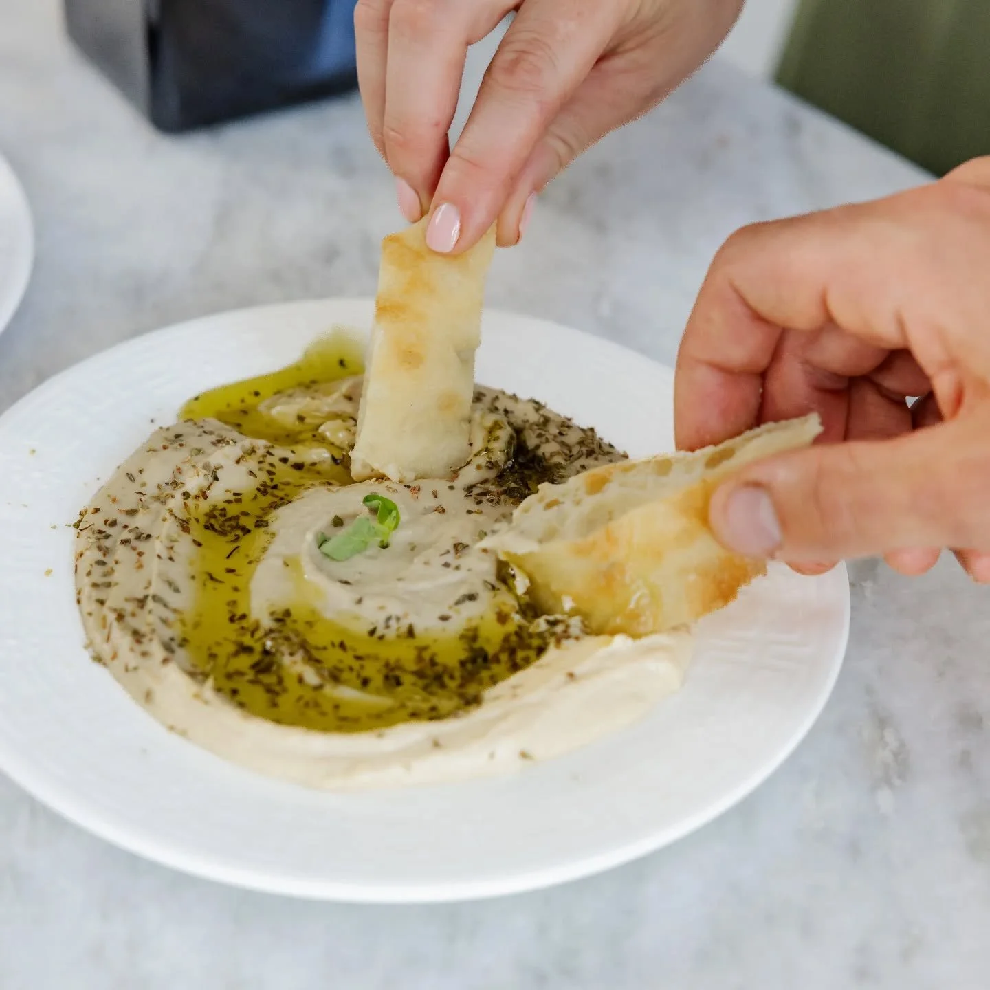 The Mediterranean way of eating is built on plants, extra virgin olive oil, and simple ingredients.

Hummus finished with fresh extra virgin olive oil and Greek oregano is a perfect place to start.

Join us this weekend at your local farmers market:
