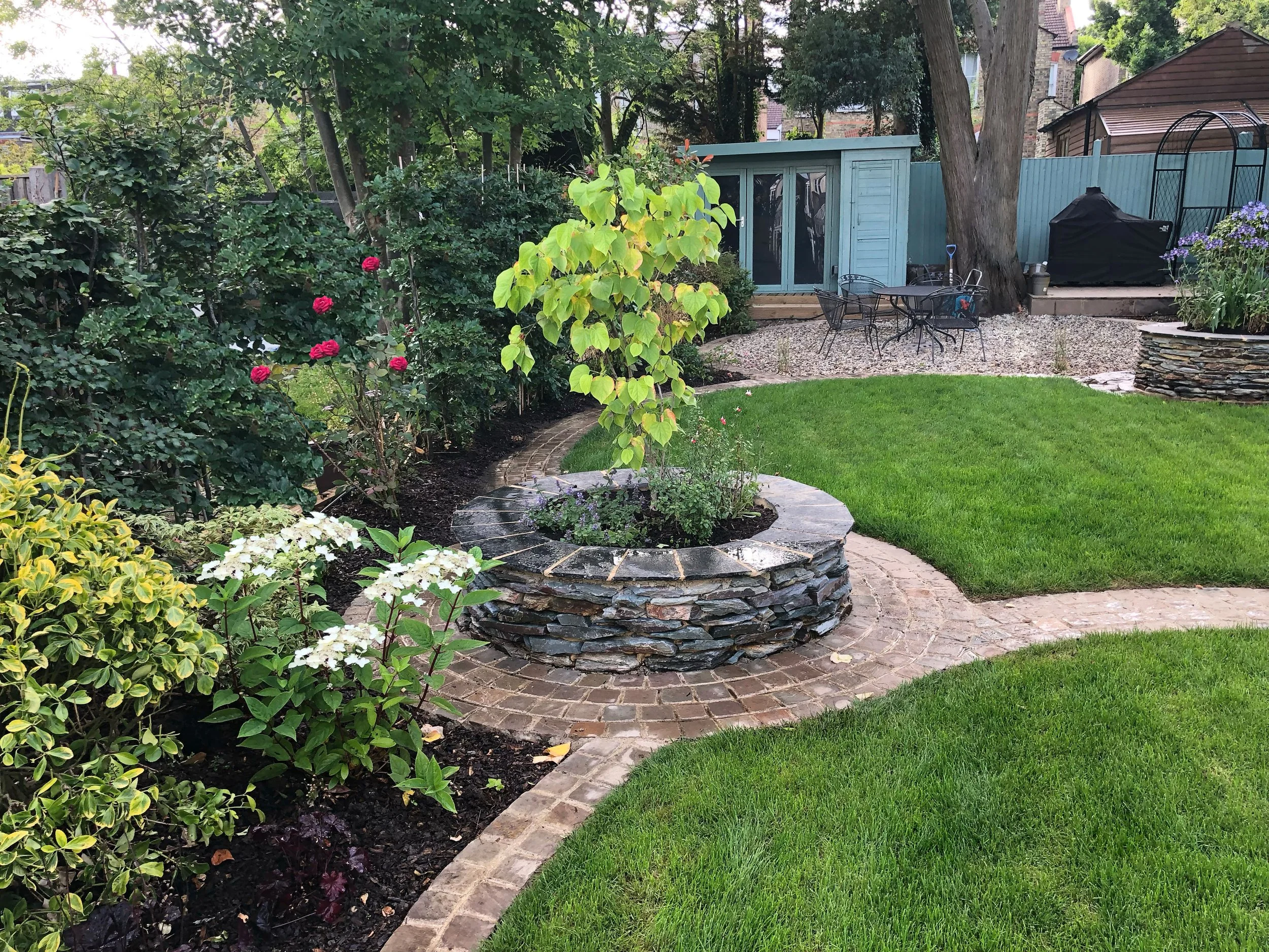 Raised stone garden feature area