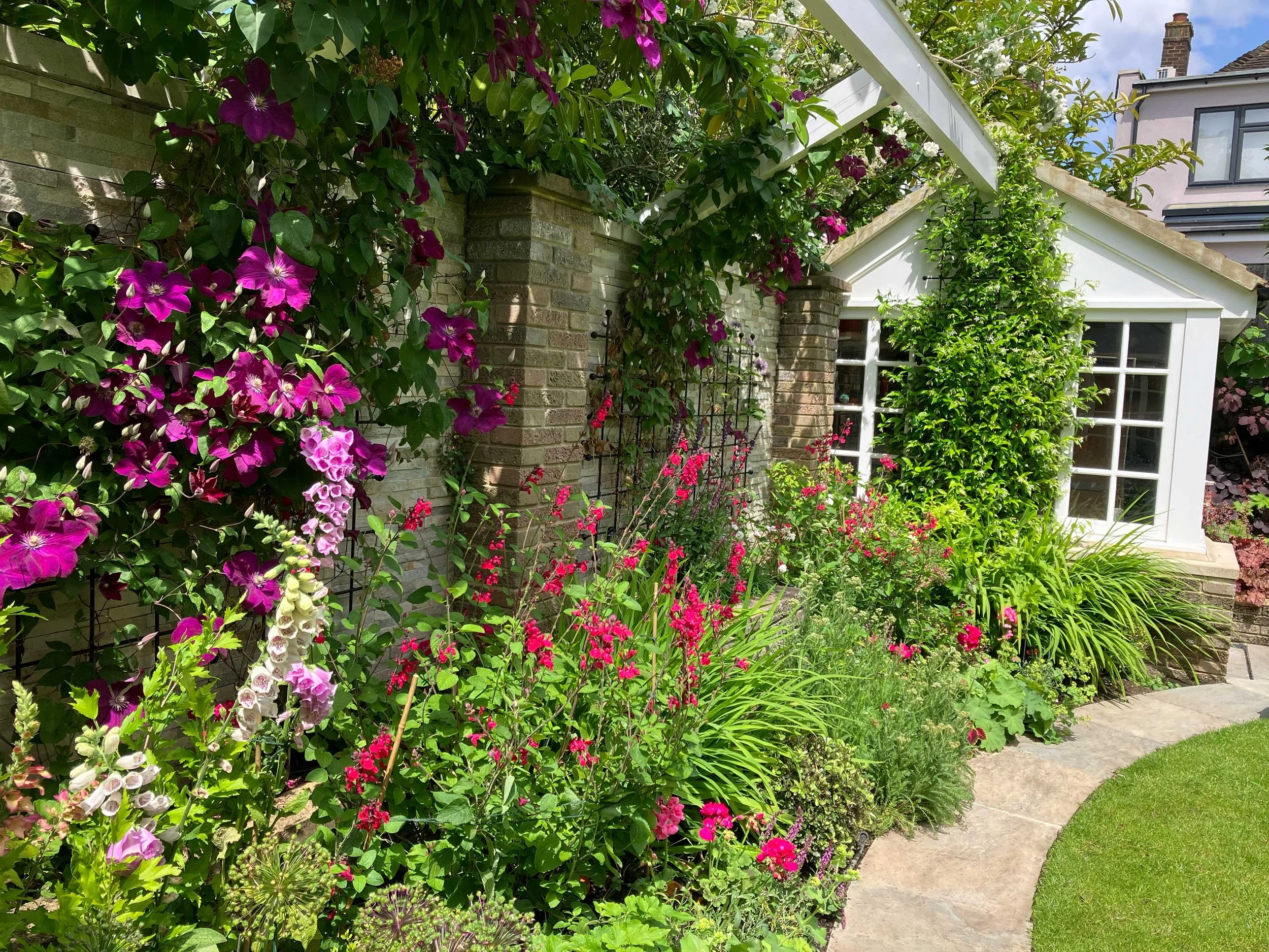 Consideration for low to high planting creates an inspiring array of colour and form