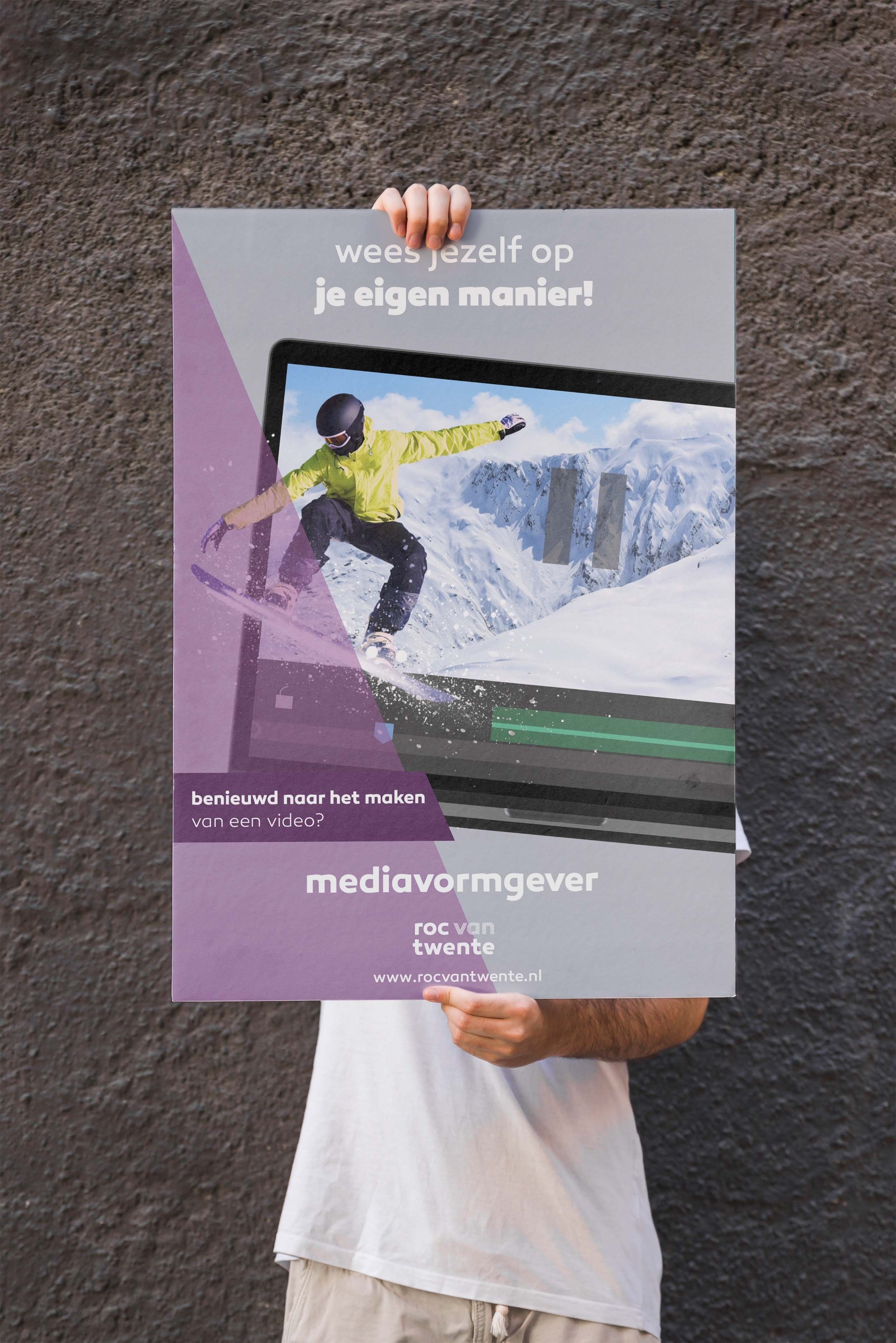 Man holding poster mockup.jpg