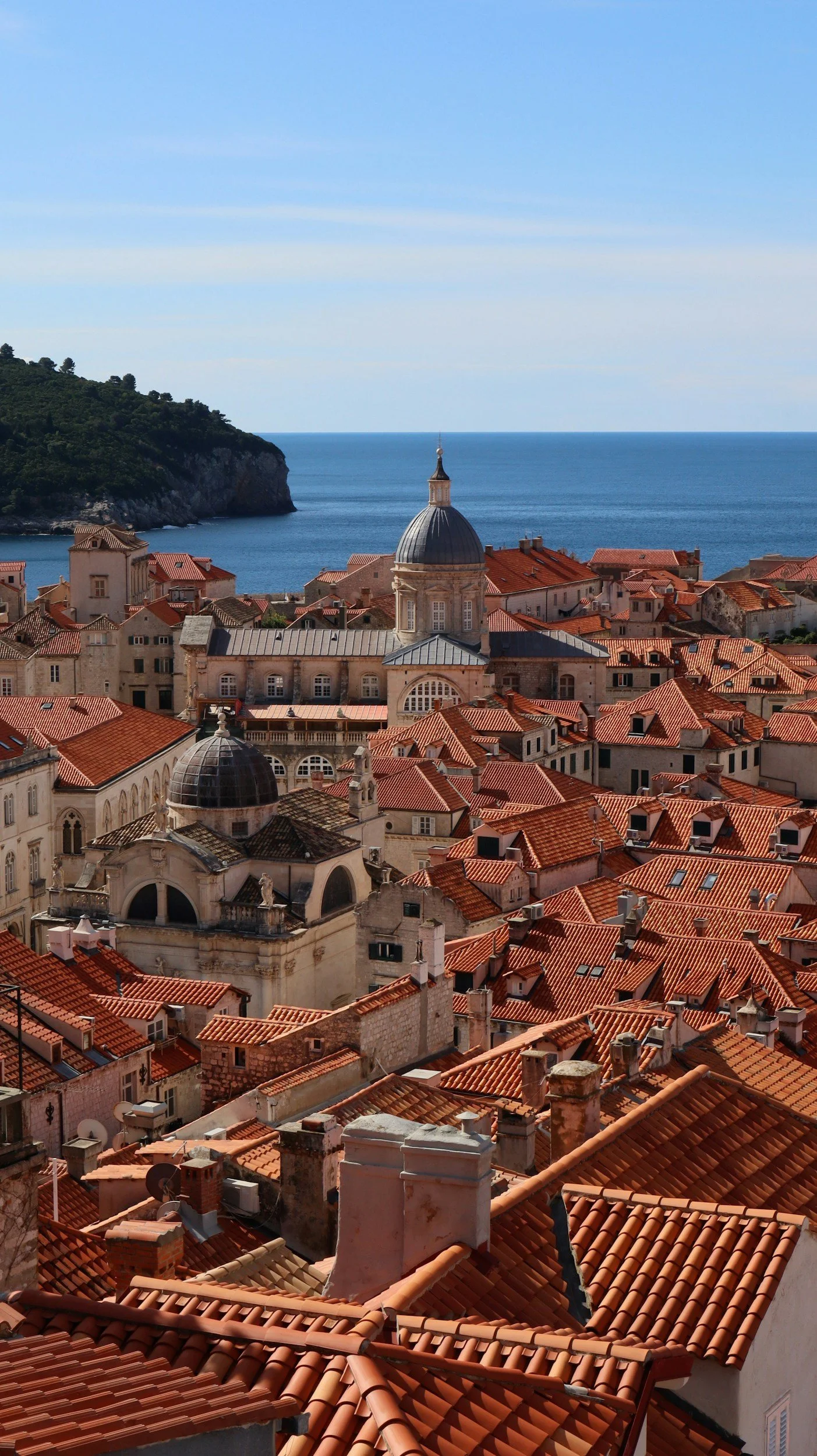 Premium executive car service arriving at the historic walls of Dubrovnik, Southern Dalmatia.