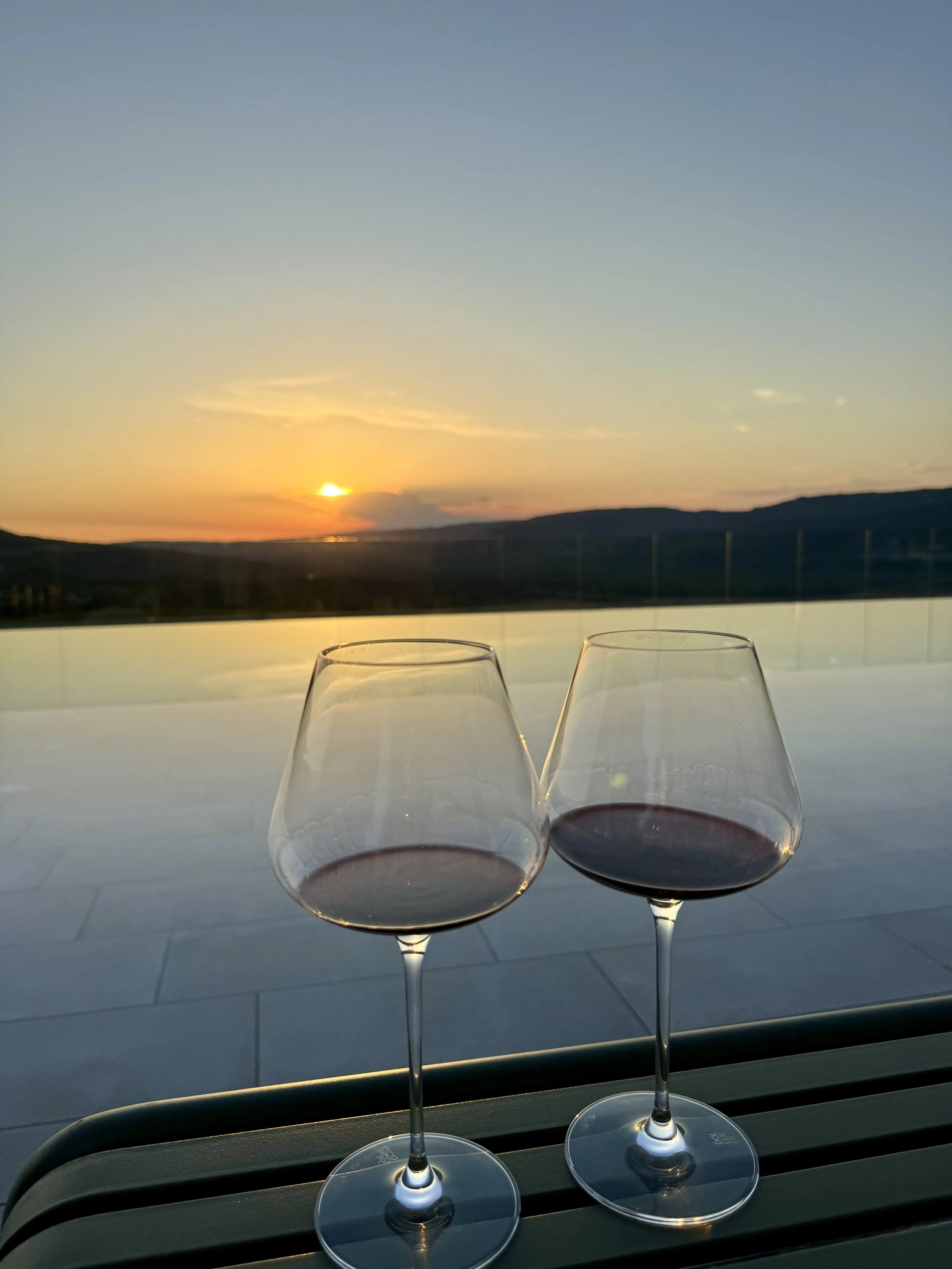 Two glasses of fine Istrian wine at sunset during a bespoke tasting experience