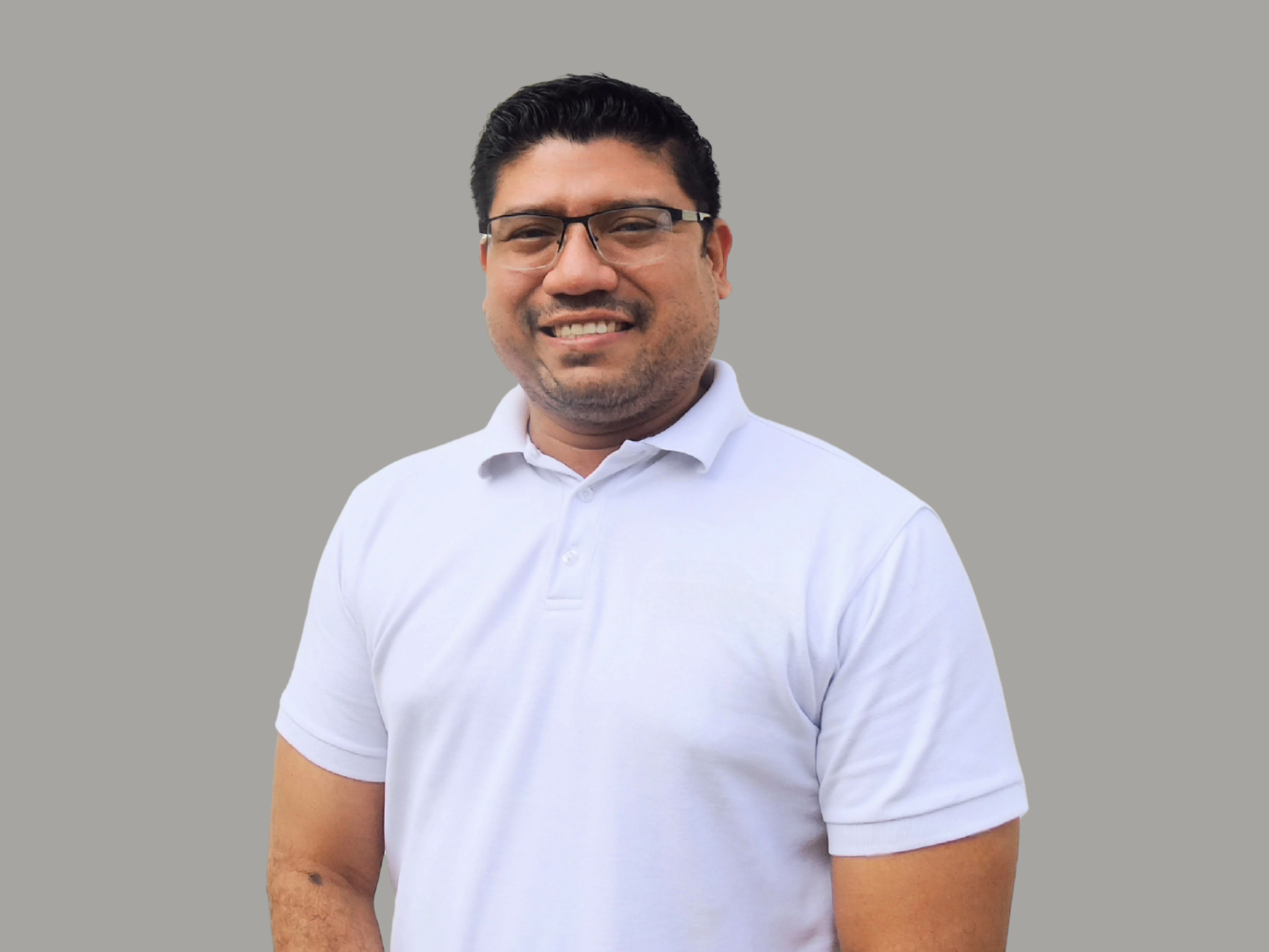 carlos carballo, finance controller, smiling and looking at the camera. Executive team member