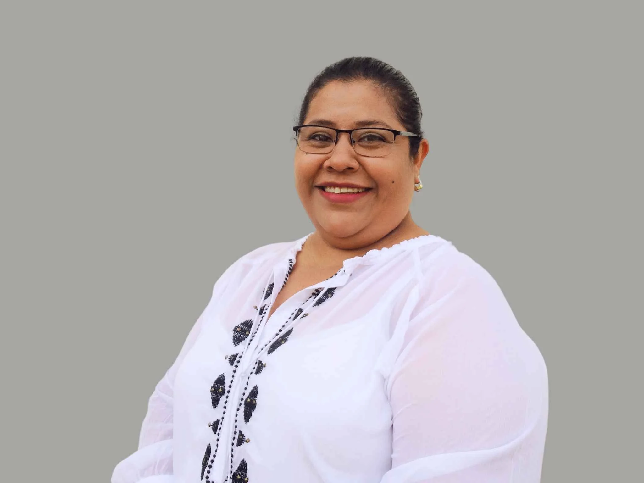 Julieta Montoya Head of Plant Certifications , smiling and looking at the camera. operations team member