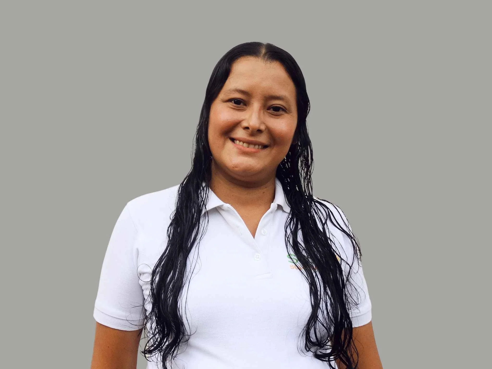 Jessica Espinoza Head of Logistics , smiling and looking at the camera. operations team member