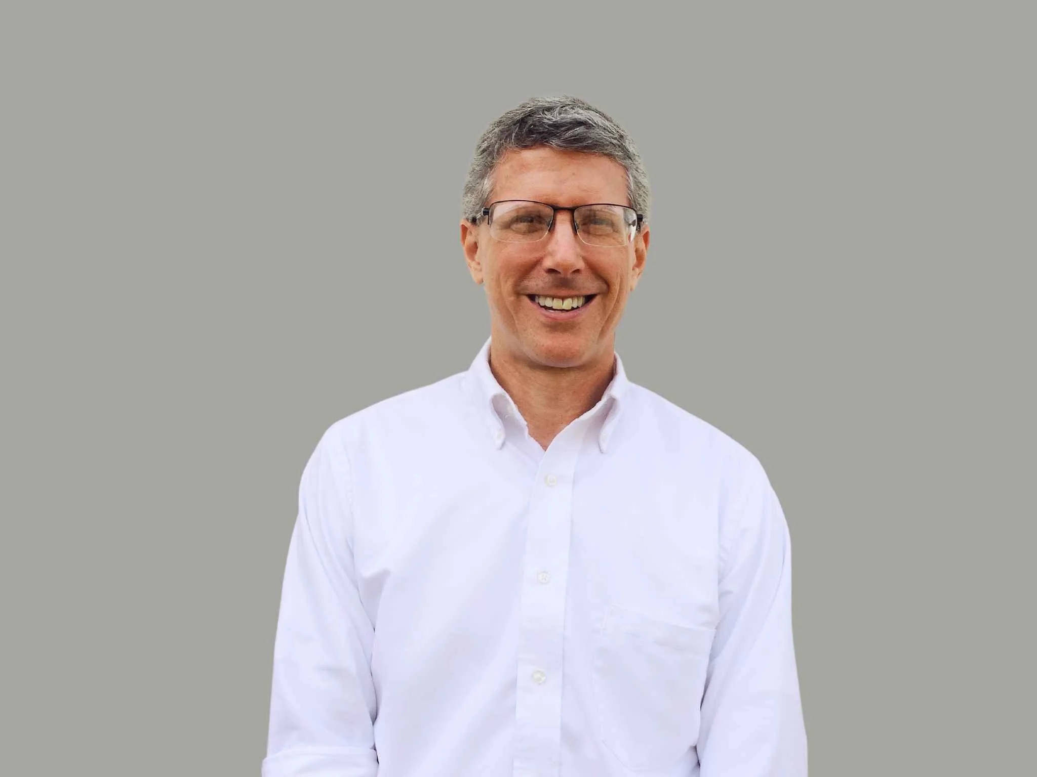 Paul Davidson, commercial director, smiling and looking at the camera. Executive team member.