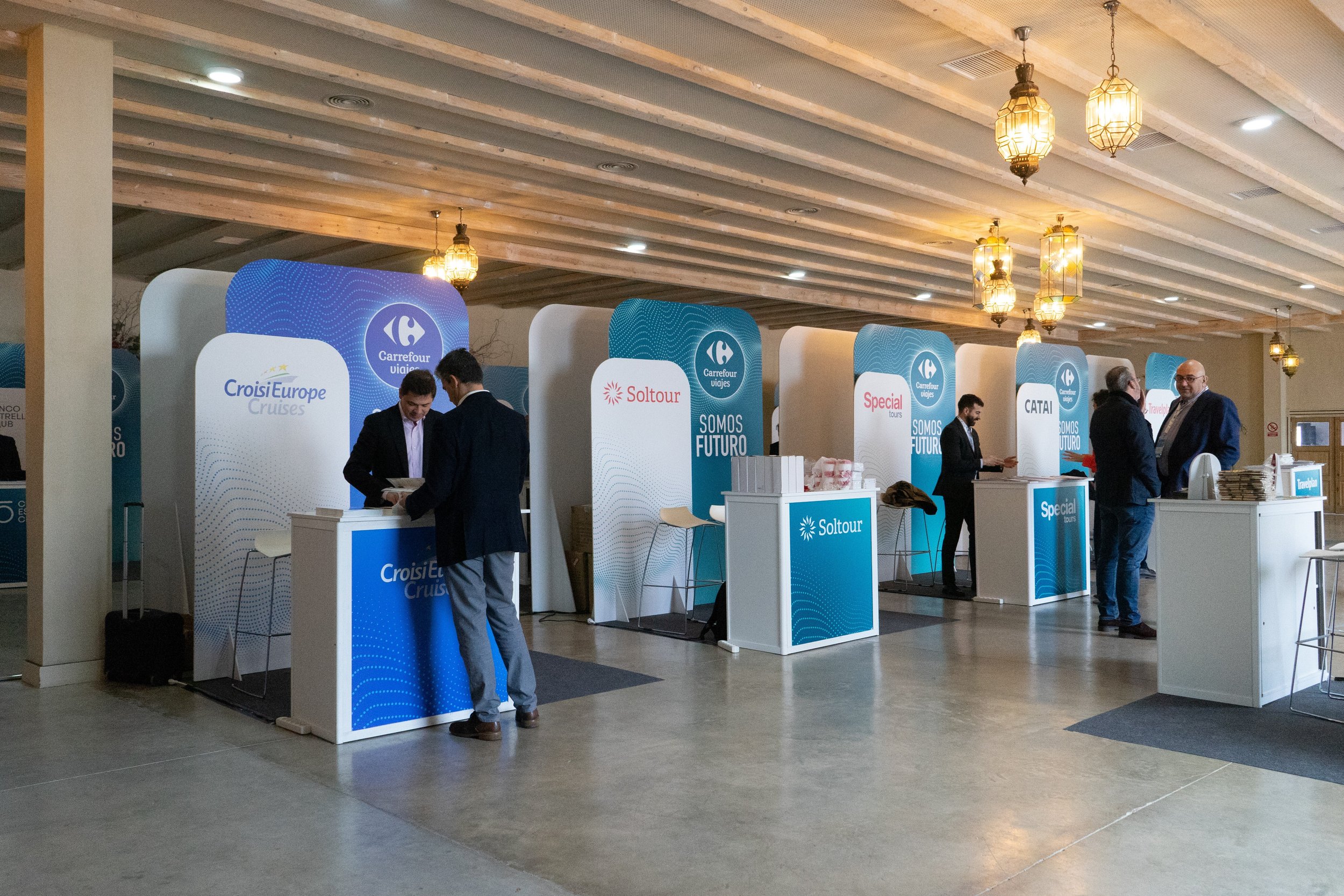 Exhibition fair with stands in a classic hall for corporate events.