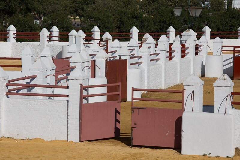 Walls and gate of bullring for outdoor events