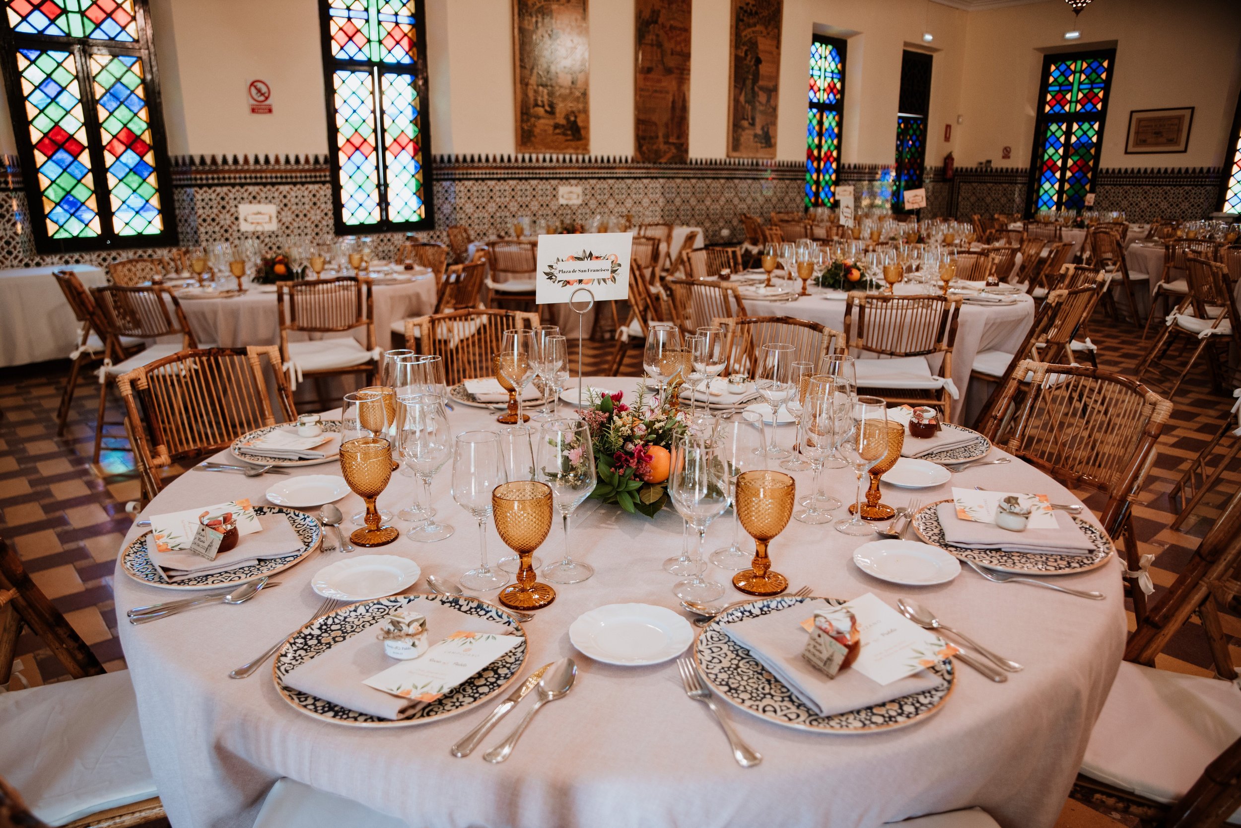 Wedding banquet in an elegant classic hall decorated with tableware and glassware