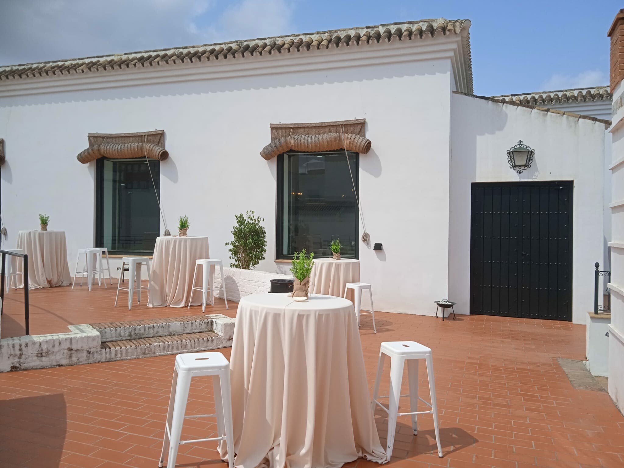 Cocktail set-up in an open-air Andalusian-style lounge