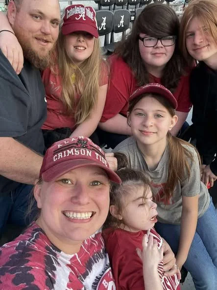 Samantha and family at the Alabama game