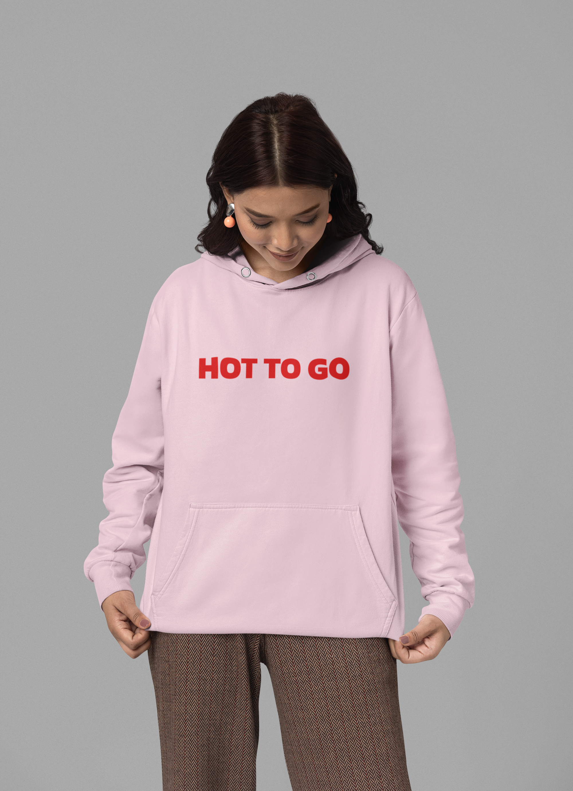 gildan-hoodie-mockup-featuring-a-smiling-woman-posing-against-a-colorful-backdrop-m37552.png