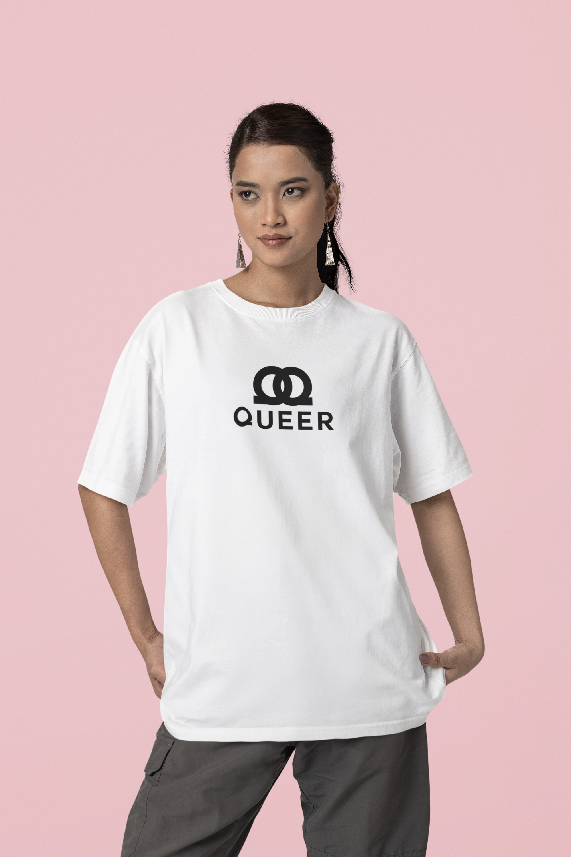 mockup-of-a-woman-wearing-an-oversized-blinkstore-tee-in-a-studio-m37650.png