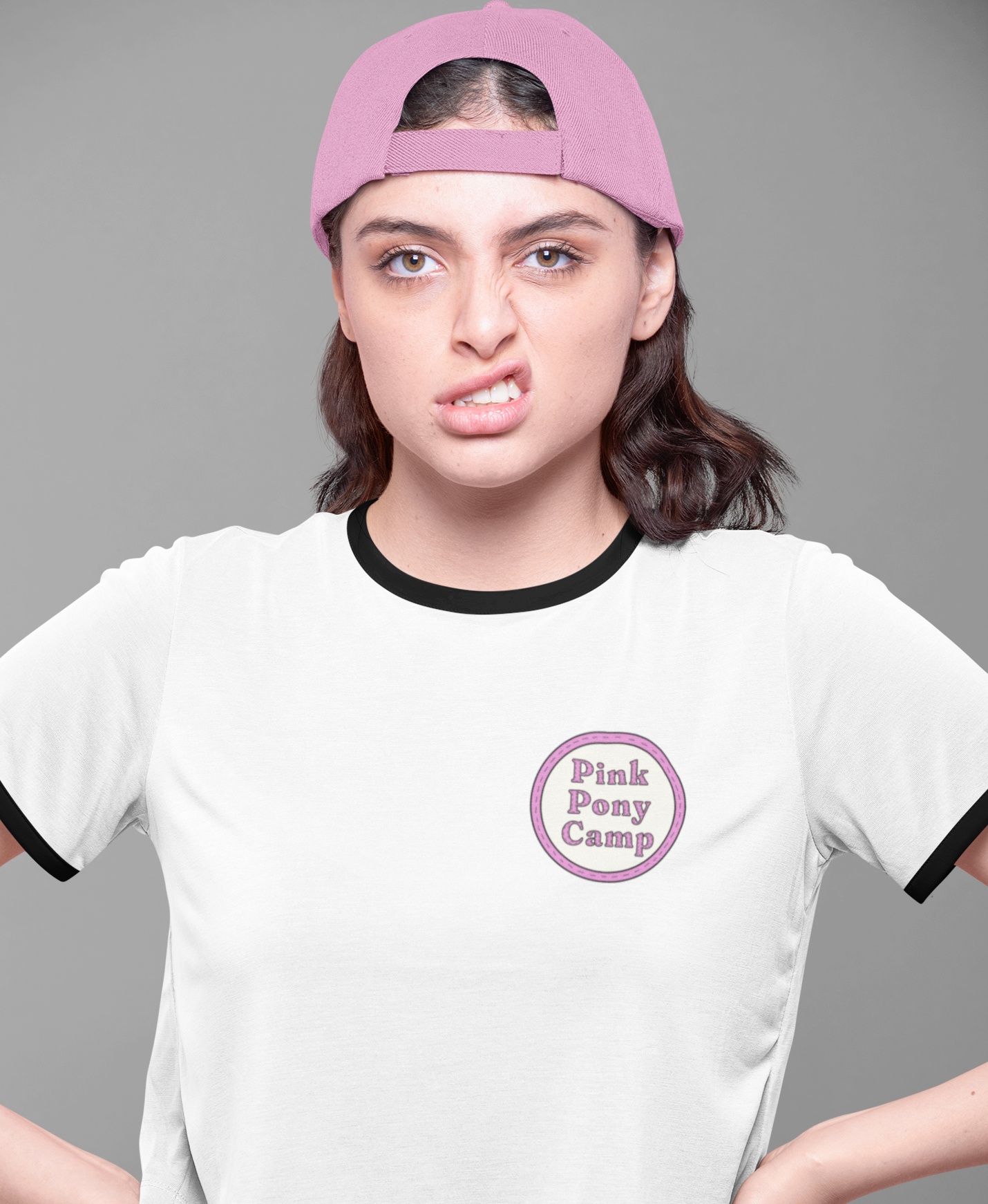 pinkponycampfrontstudiowhitehat.png