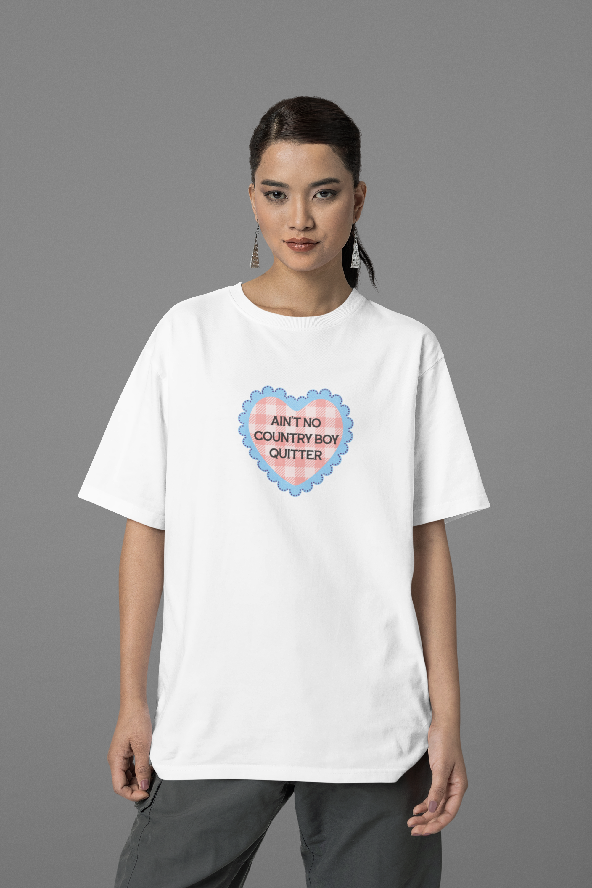 mockup-of-a-woman-wearing-an-oversized-t-shirt-from-blinkstore-in-a-studio-m37649.png