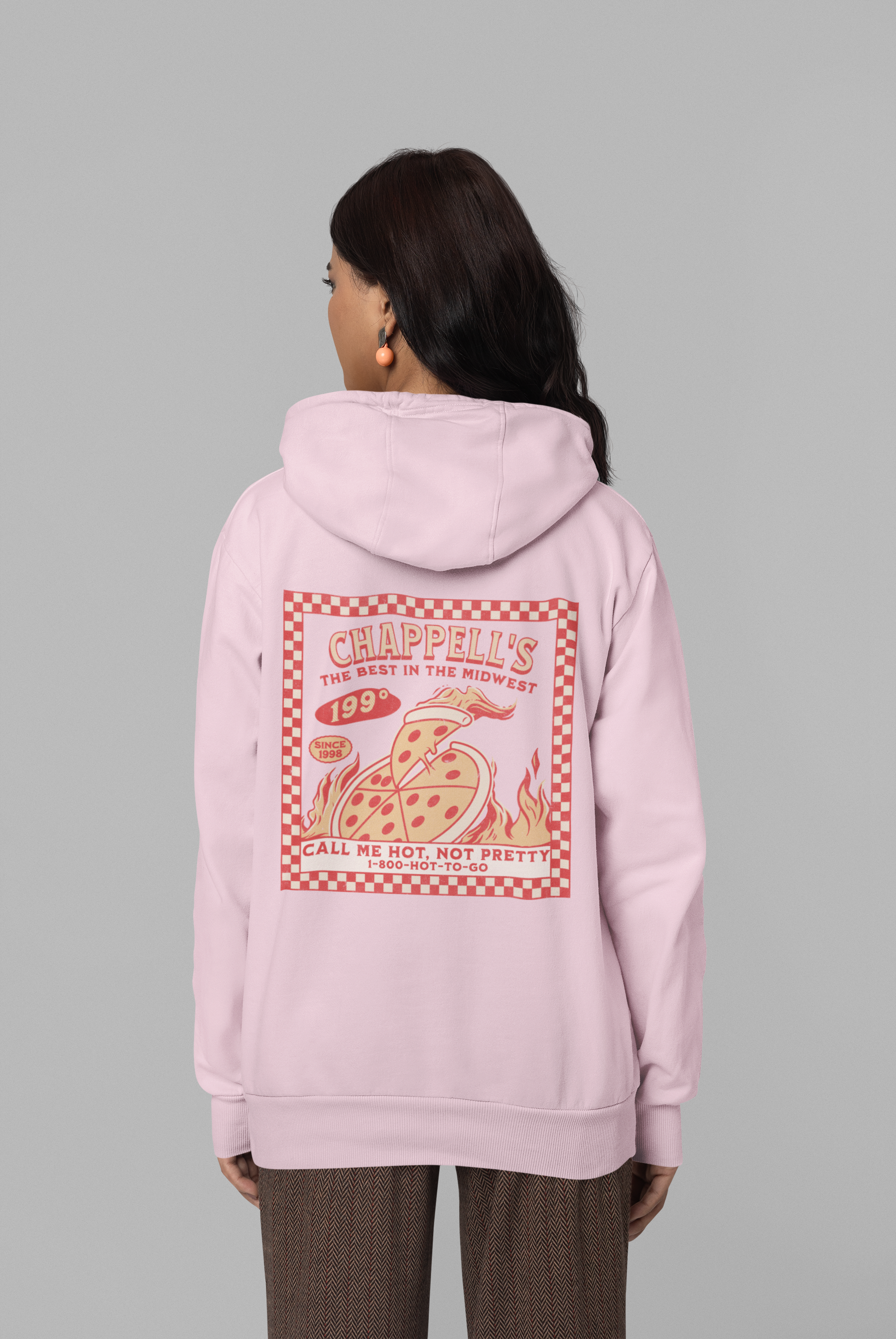 back-view-gildan-hoodie-mockup-of-a-woman-standing-against-a-colorful-background-m37535.png