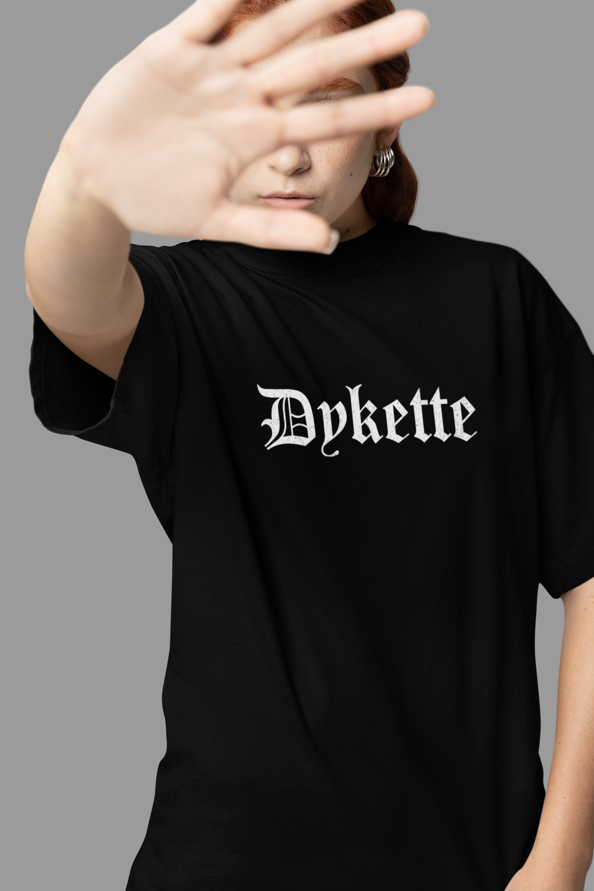 mockup-of-a-woman-covering-her-face-and-wearing-an-oversized-t-shirt-in-a-studio-m38935 (5).png