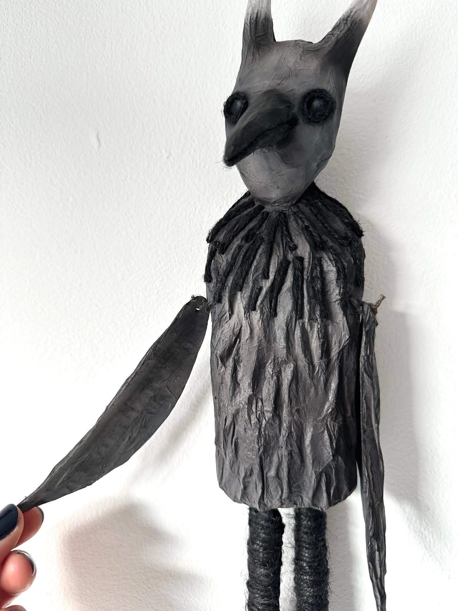 Crow Creature eco-conscious sculpture showing moving wing detail
