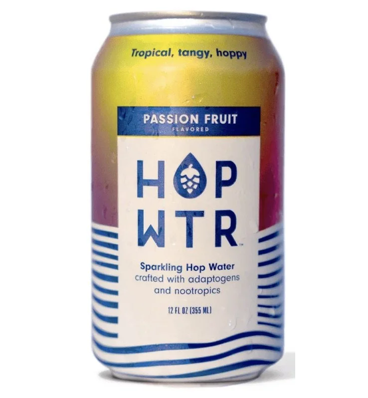 Can of Hop WTR Passion Fruit flavored sparkling hop water, 12 fl oz, with adaptogens and nootropics, featuring a colorful gradient design.