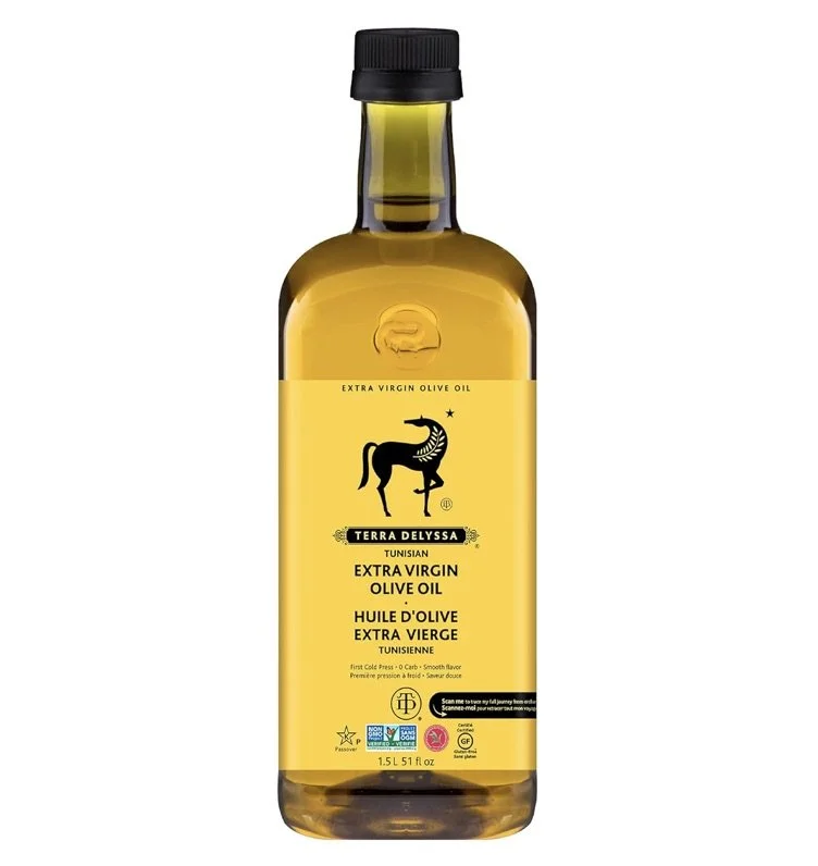 Bottle of Terra Delyssa Tunisian extra virgin olive oil, 1.5L size, with yellow label featuring a black horse logo.
