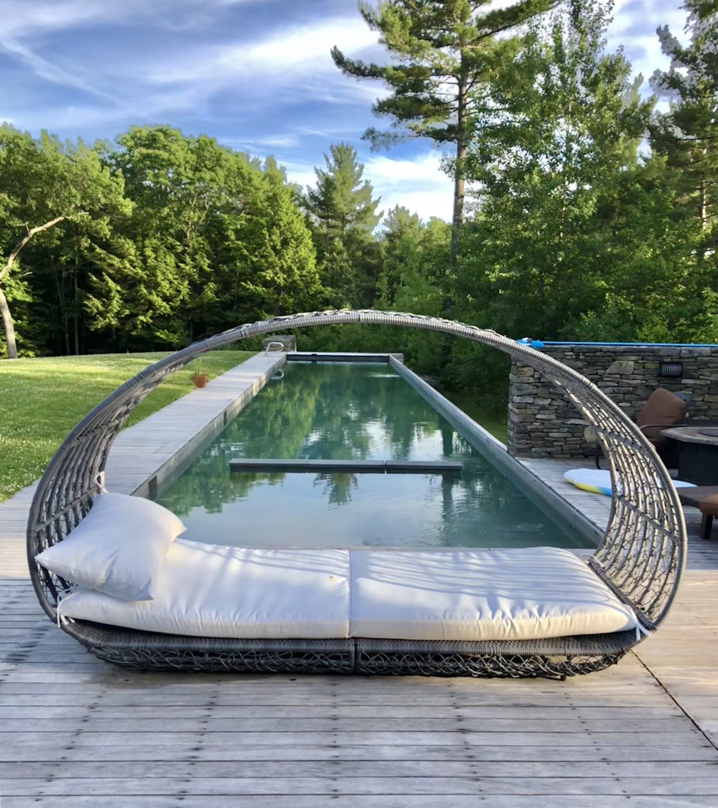 1aelegant-daybed-in-front-of-a-long-narrow-lap-pool-2023-11-27-05-22-24-utc.jpg