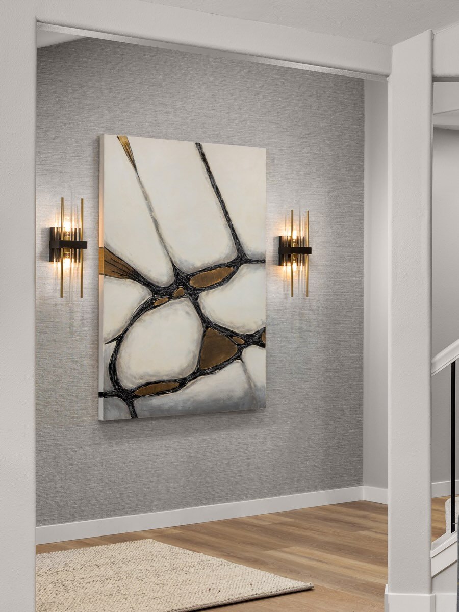 What a difference artwork can make. The perfect piece can completely transform a space, adding warmth, character, and that finishing touch that brings it all together. ✨ #interiordesign #residentialdesign #remodel #entrydesign #artwork