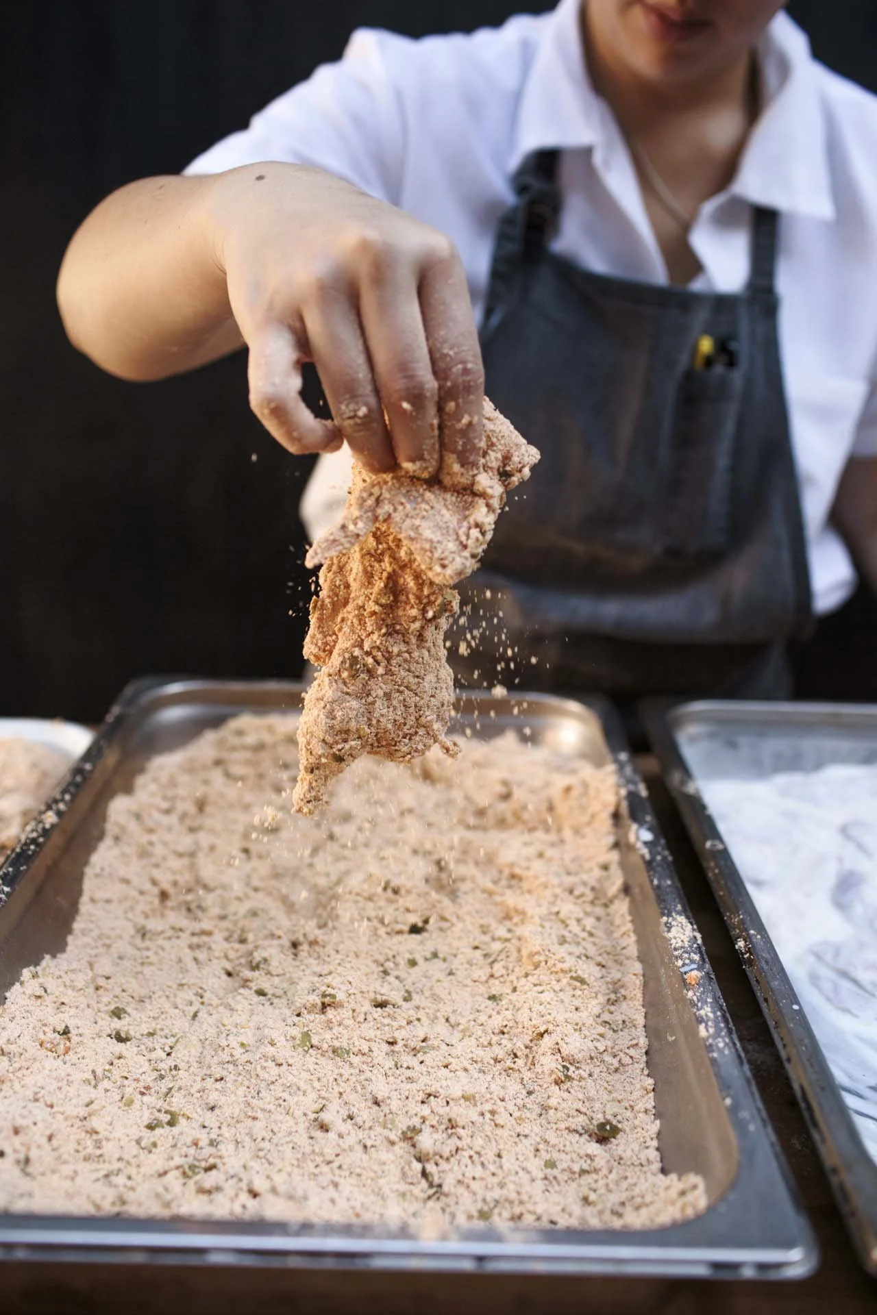 Quail being dredged in State Bird flour