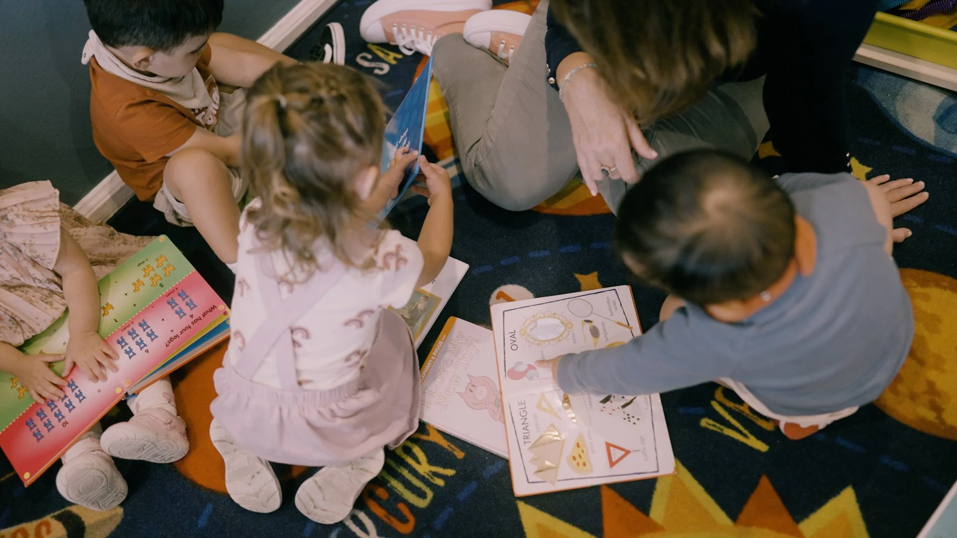 Little Explorers reading.jpg