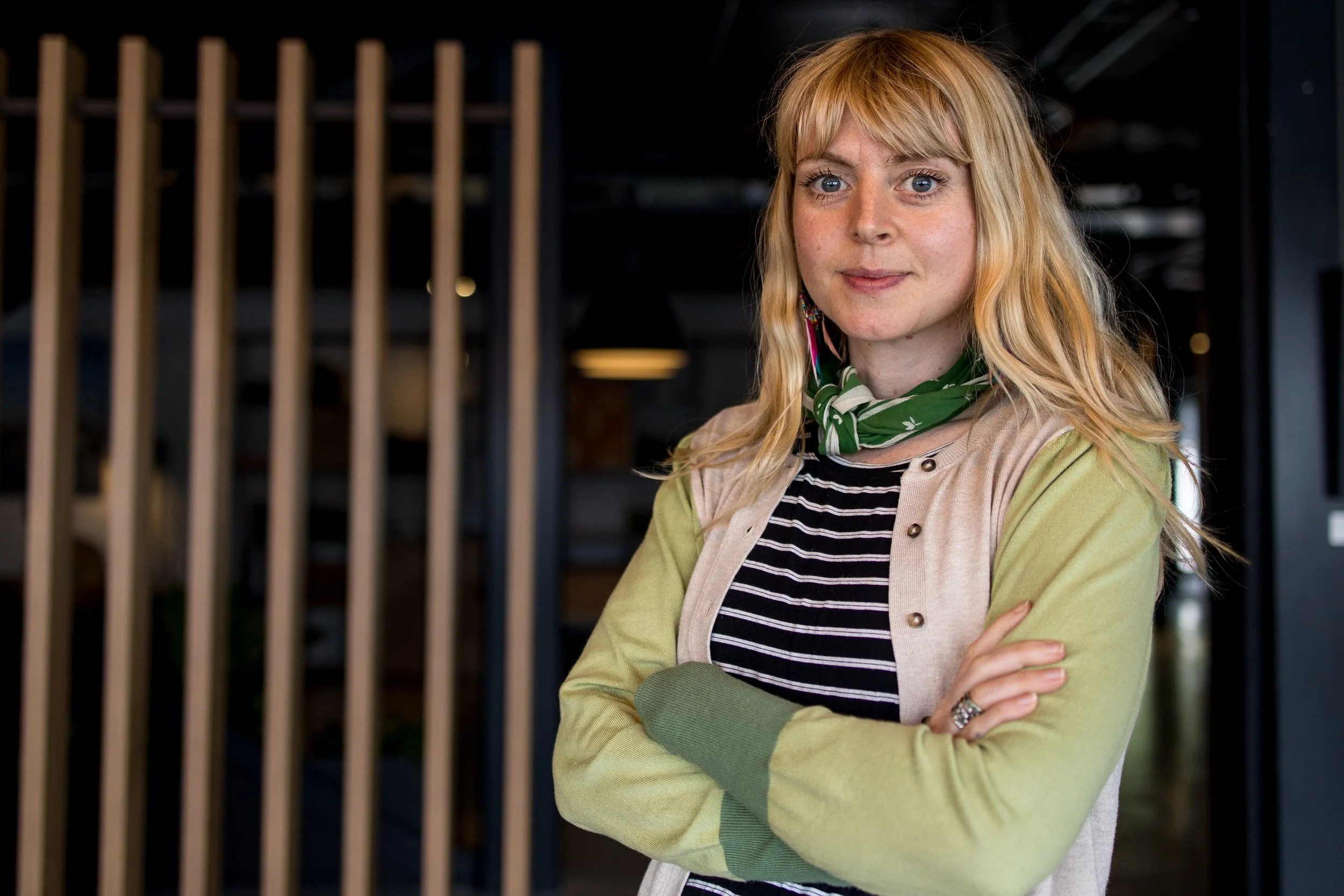 Dora Crossed arms smile business.JPG