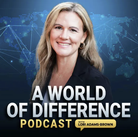 Cover image of a podcast titled 'A World of Difference' with host Lori Adams-Brown, featuring a woman with long blonde hair, wearing a dark blazer, standing in front of a digital world map background.