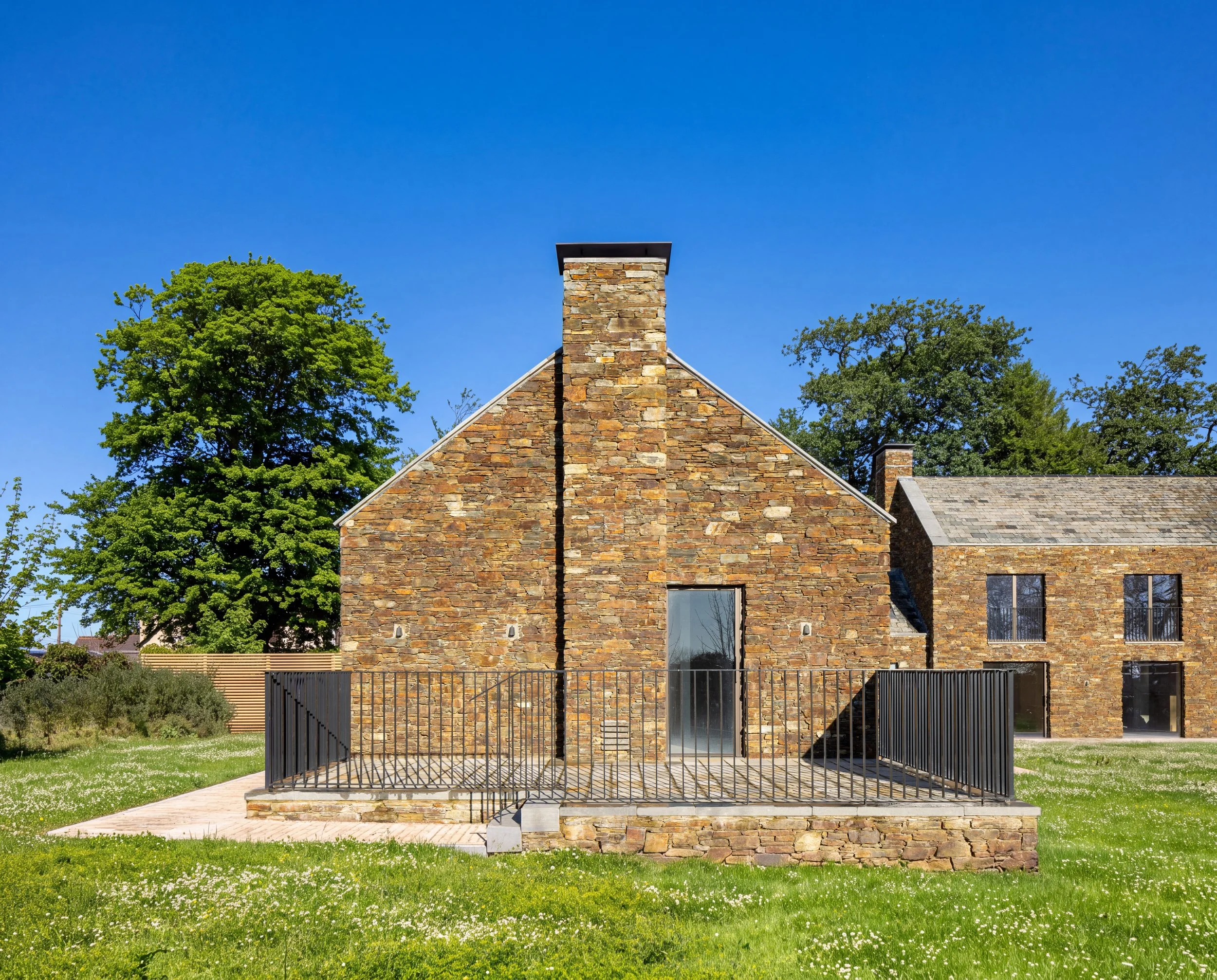   The result is a group of homes that feels at home in Cornwall without trying to look old. Traditional materials, local building traditions and the particular character of the site provide the starting point, but the houses belong to the present.   