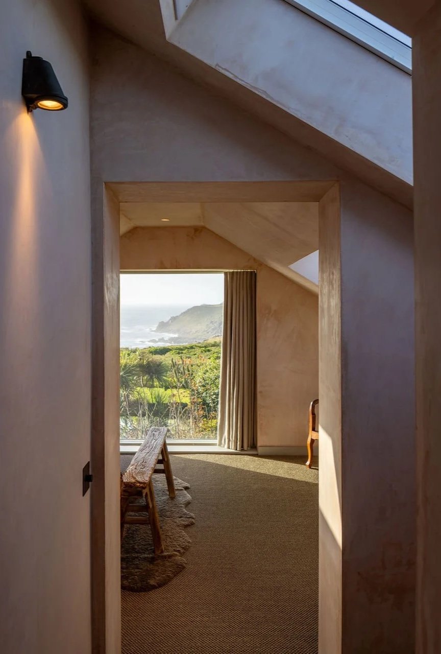   

 

  Carefully positioned openings frame specific moments in the landscape - from glimpses of the Atlantic beyond the courtyard to a dramatic 2 × 2 metre picture window in the first-floor master suite overlooking Cape Cornwall.  