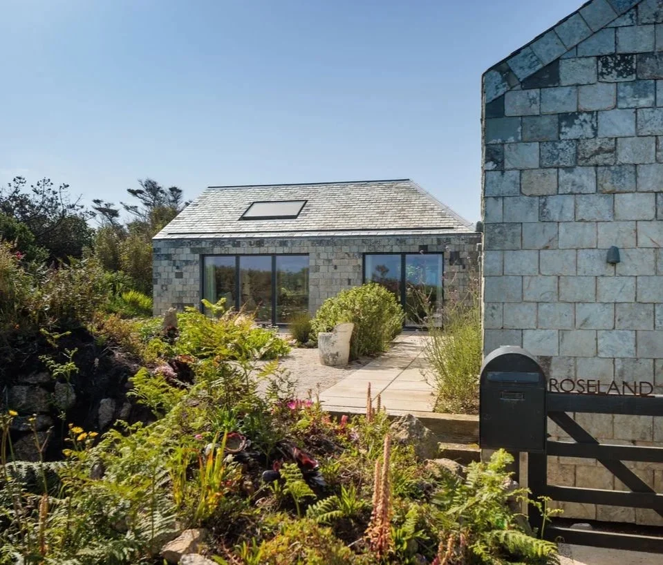   

 

  The bungalow has been carefully reimagined as a home for a working couple and their adult children, providing four bedrooms and a home office overlooking the rugged coastline.  