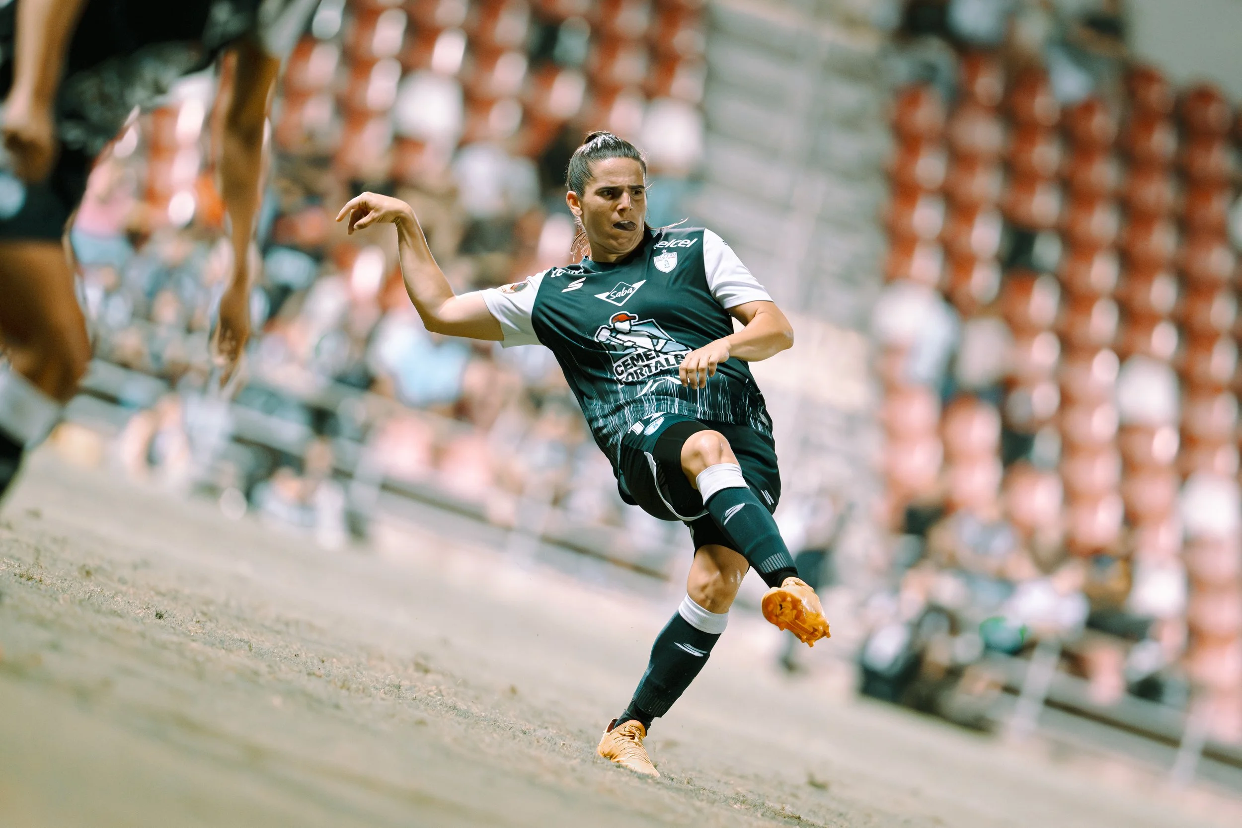 Pachuca Femenil - Andrea Pereira, female soccer player kicking a soccer ball during a match (Campeon de Campeonas in San Antonio, Texas)