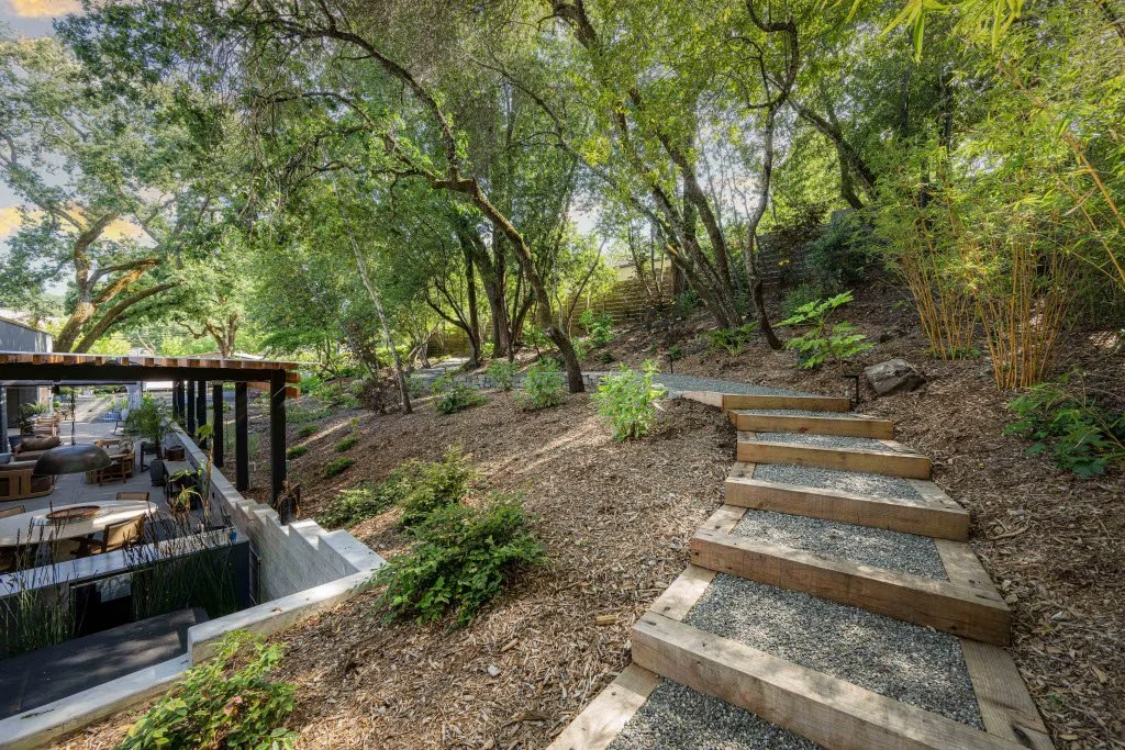 Tiered landscape terracing on a sloped backyard in Healdsburg, CA
