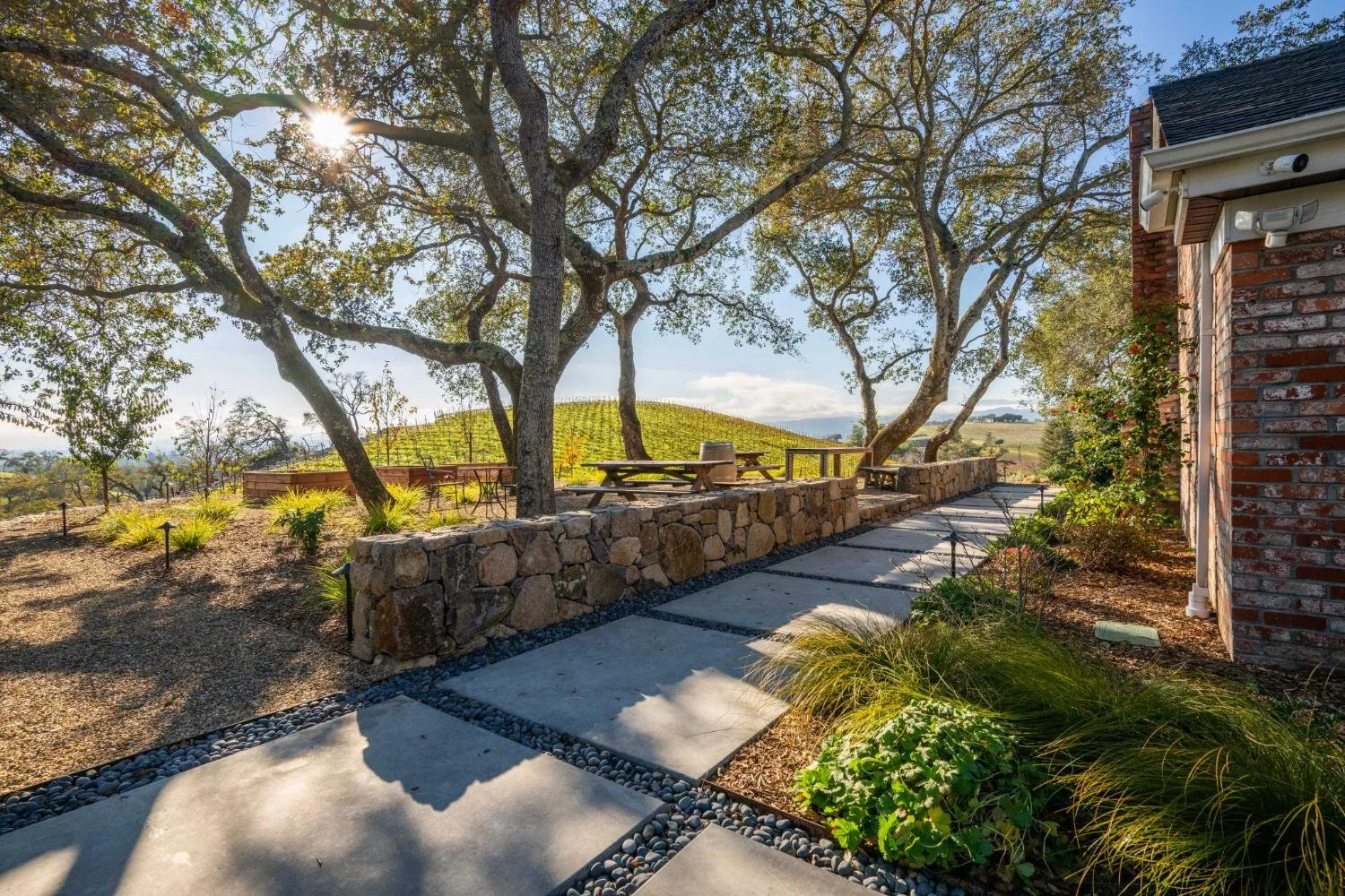 Custom stone wall terracing built from on-site materials in Napa, CA