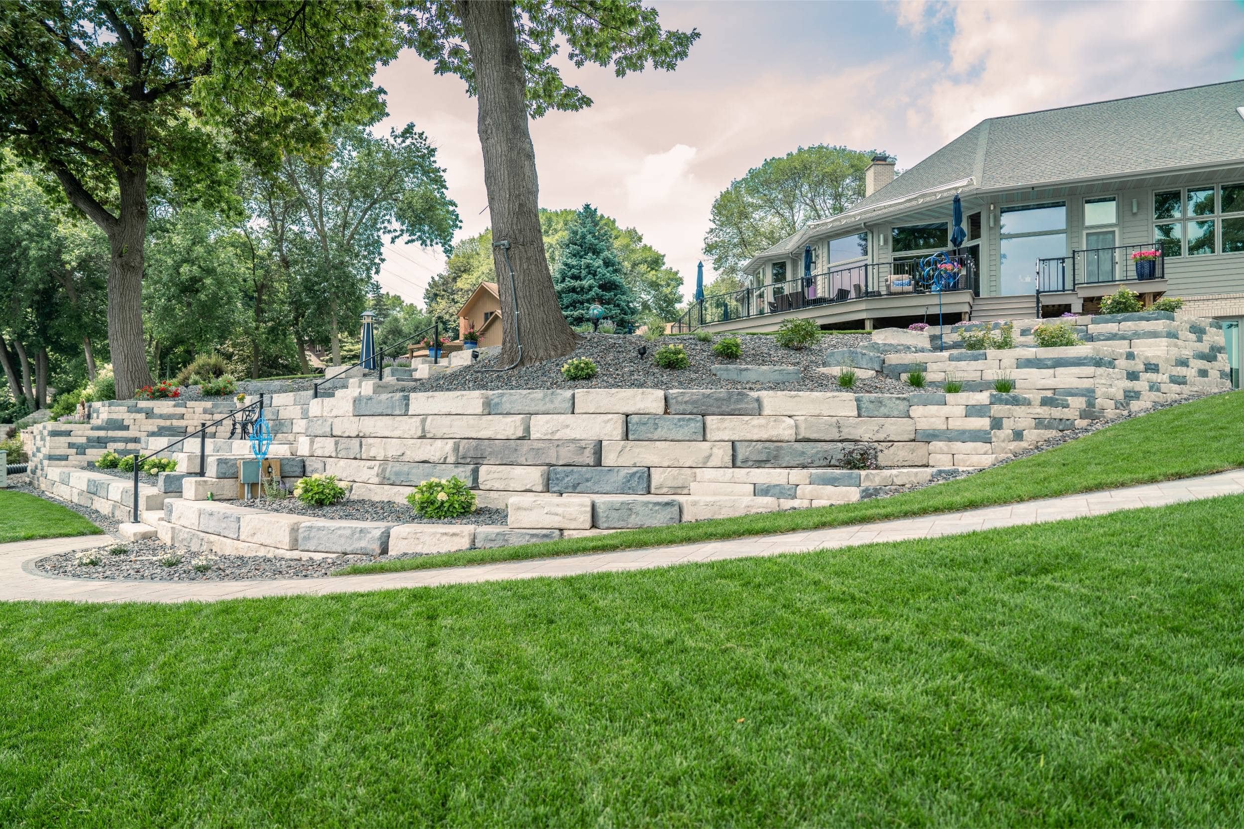 A tiered retaining wall and plantings from a nursery near me in Fox Valley, WI