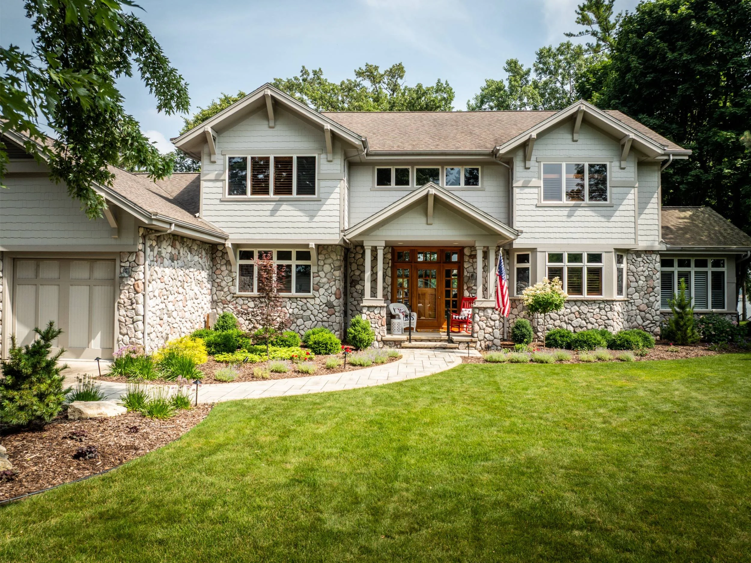 A thoughtfully designed backyard by a trusted deck builder near me in De Pere, WI