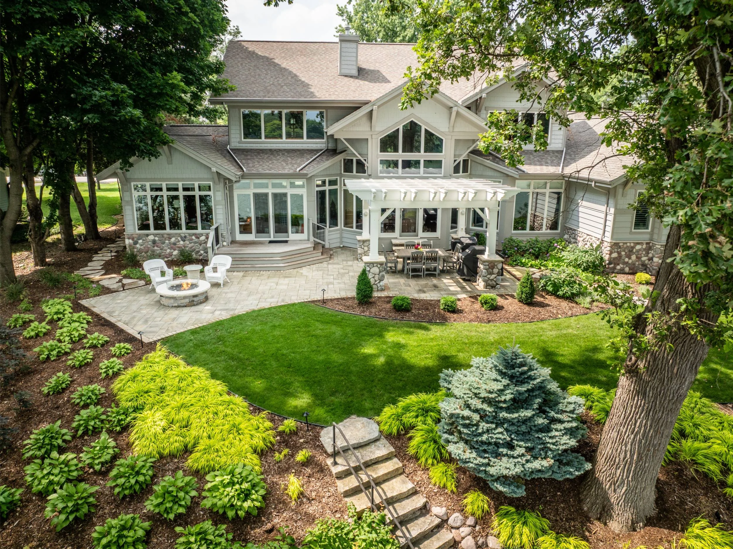 A riverside view enhanced with soft outdoor lighting in Green Bay, WI