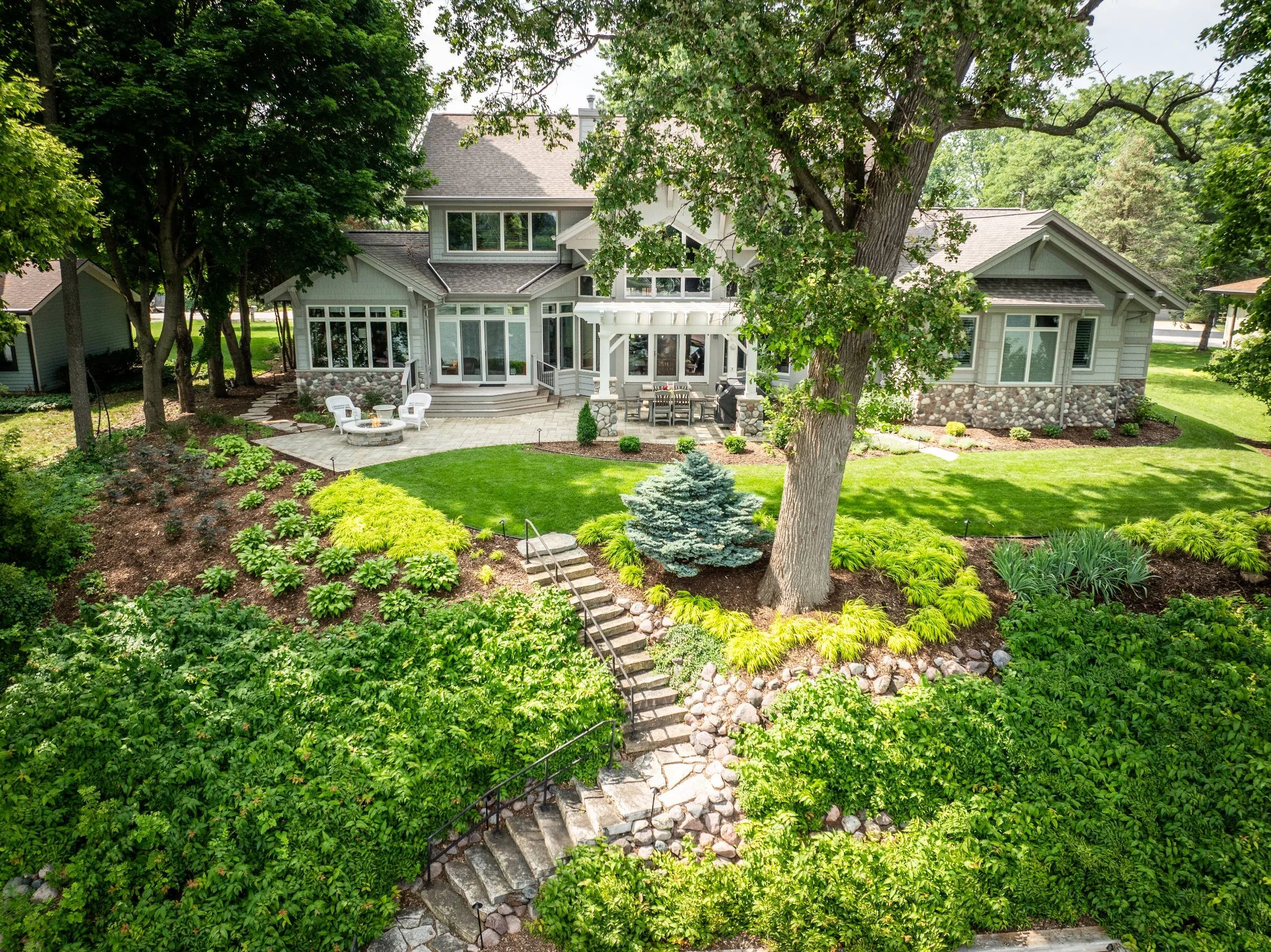 A backyard oasis created by a deck builder near me in the Fox Valley, WI
