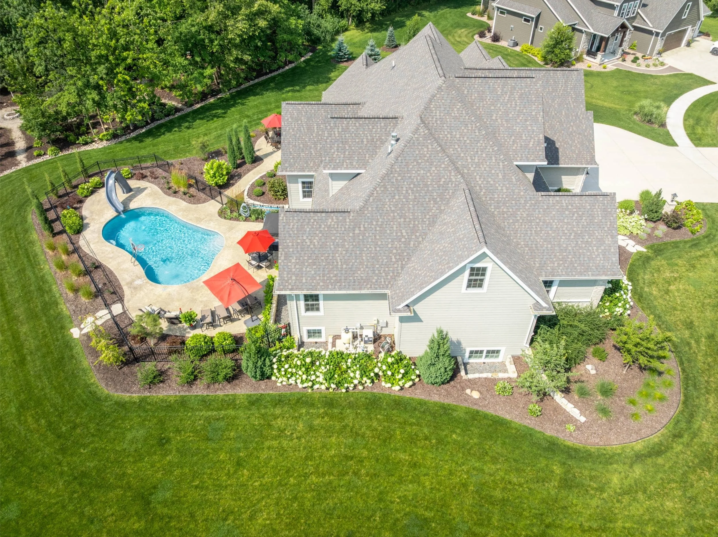 A peaceful wooded retreat with custom outdoor lighting in Green Bay, WI