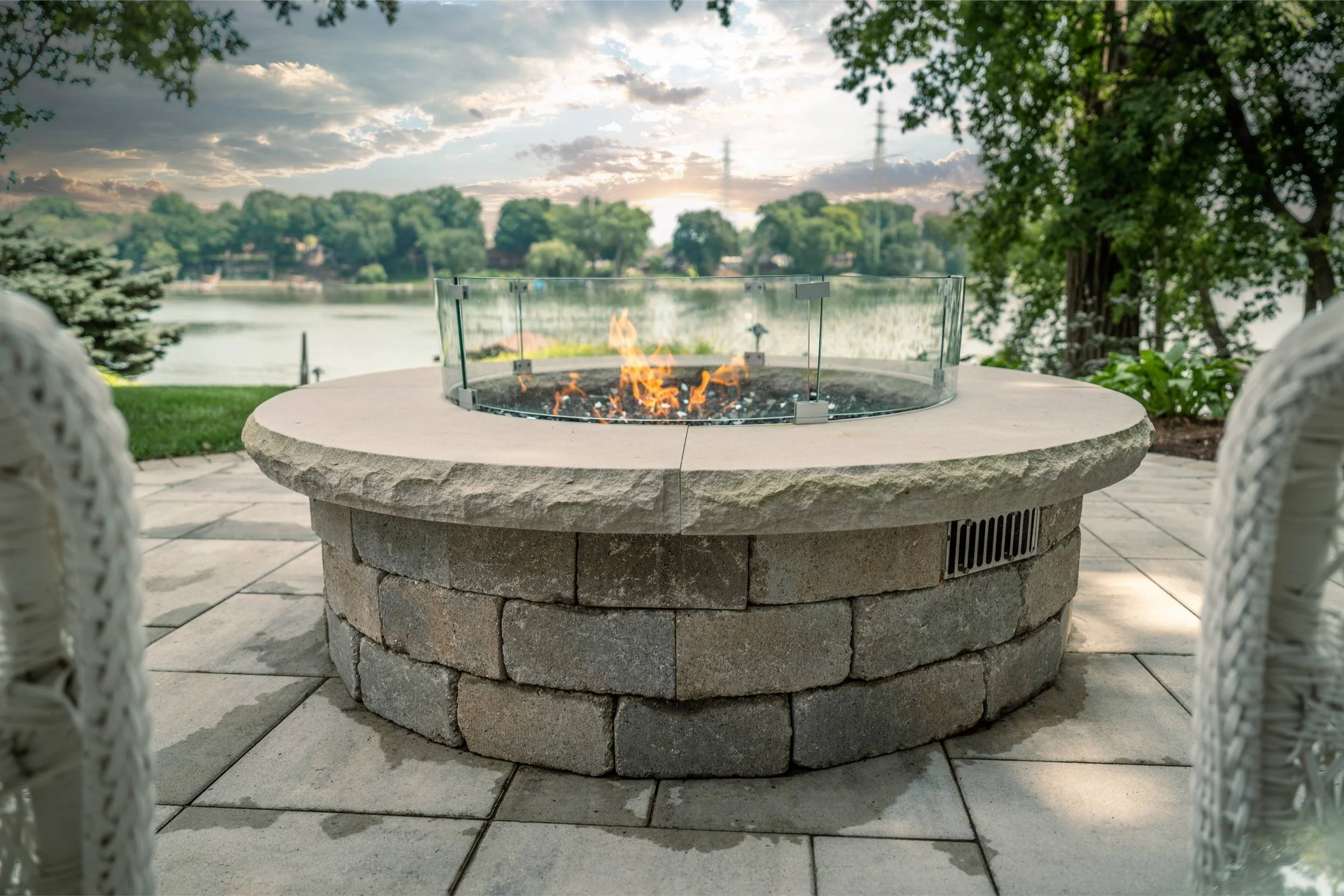 A hillside backyard stabilized with expert landscaping near me in Oshkosh, WI