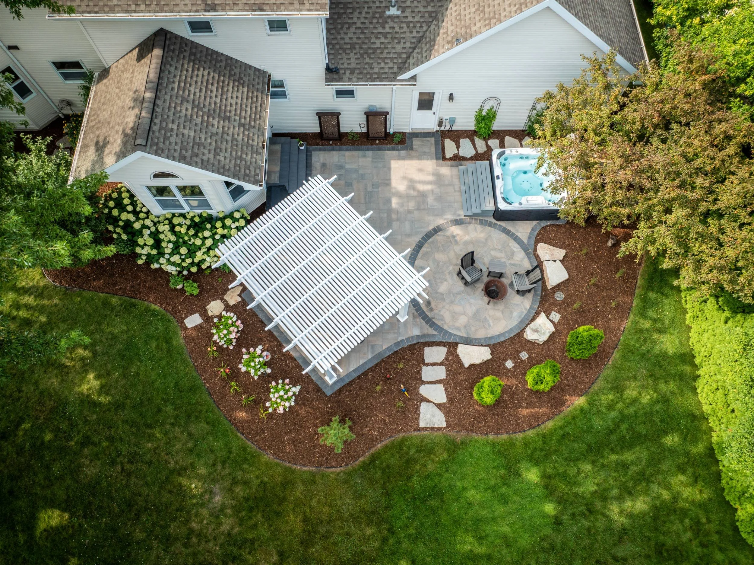 A plant-rich outdoor living area sourced from a garden center in Appleton, WI