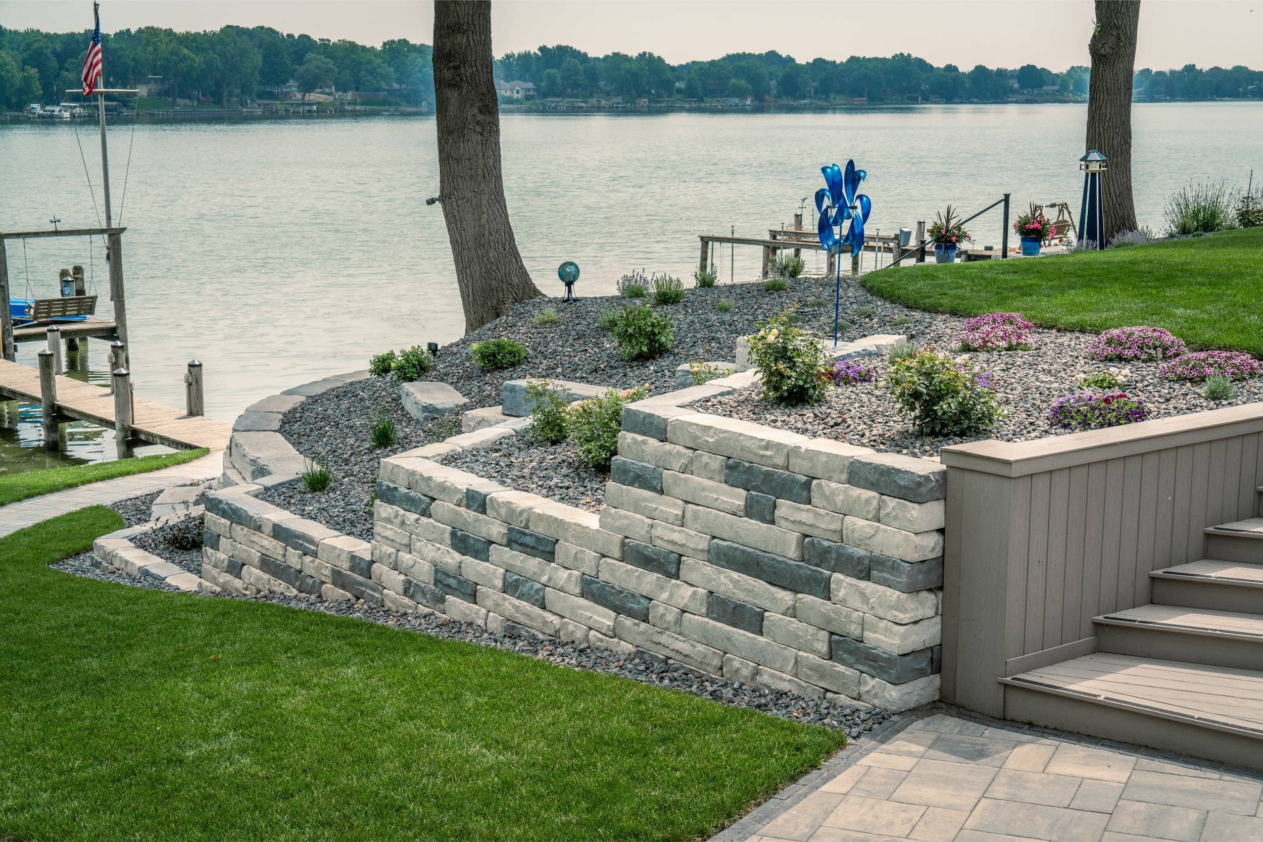 A lakeside landscape supplied by a local garden center in Appleton, WI