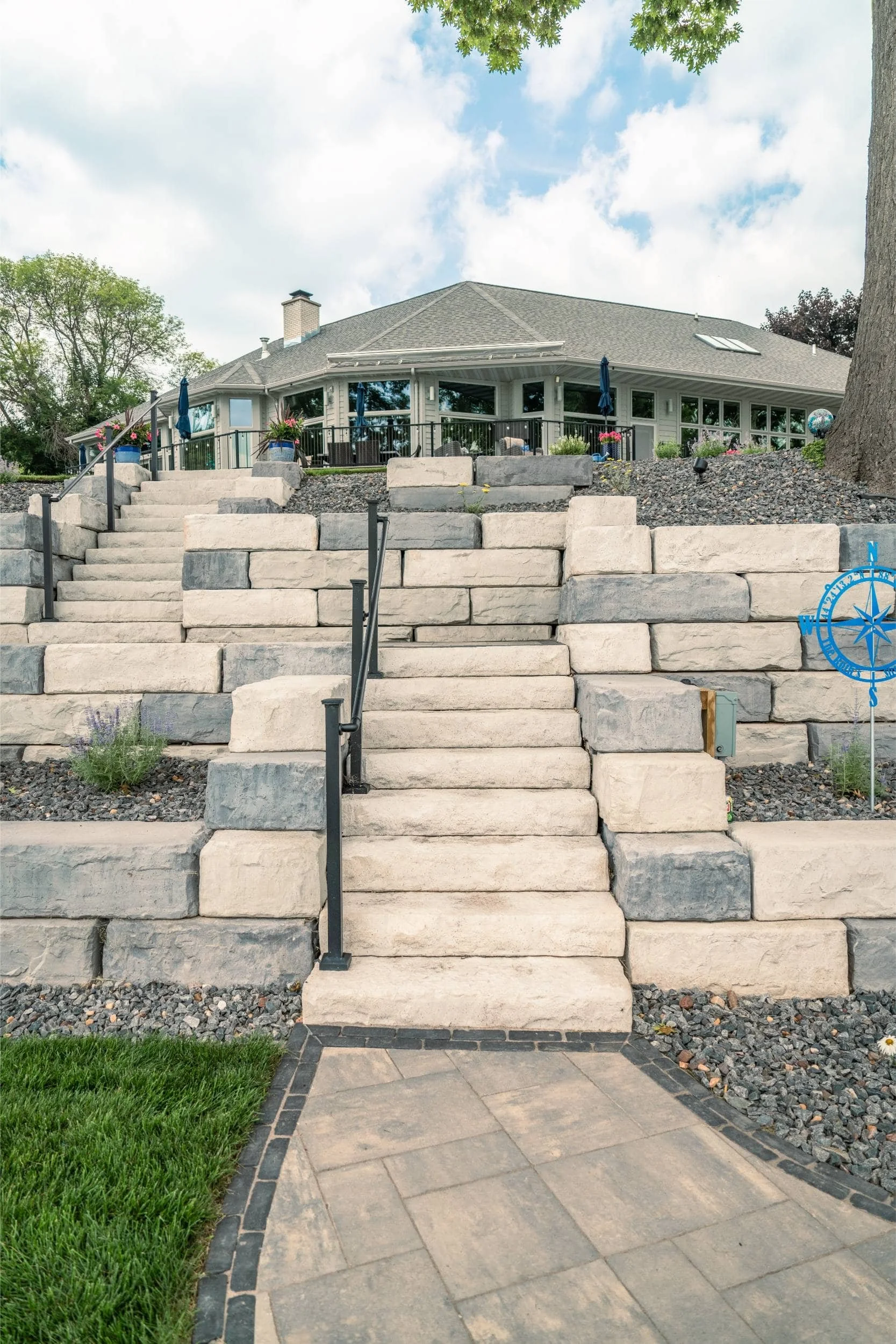 A lakefront property built with expertise from a deck builder near me in De Pere, WI