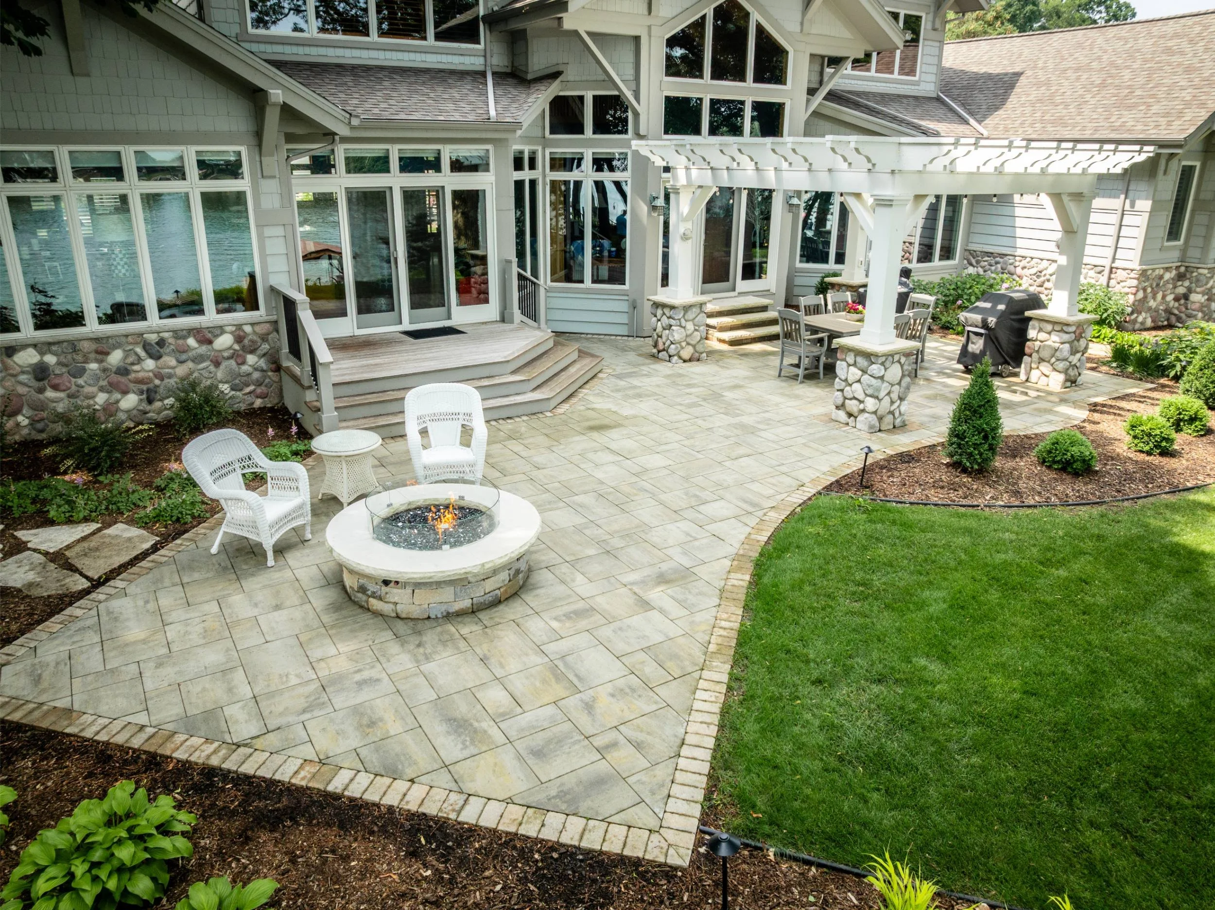 A paver patio accented with outdoor lighting in Greenville, WI