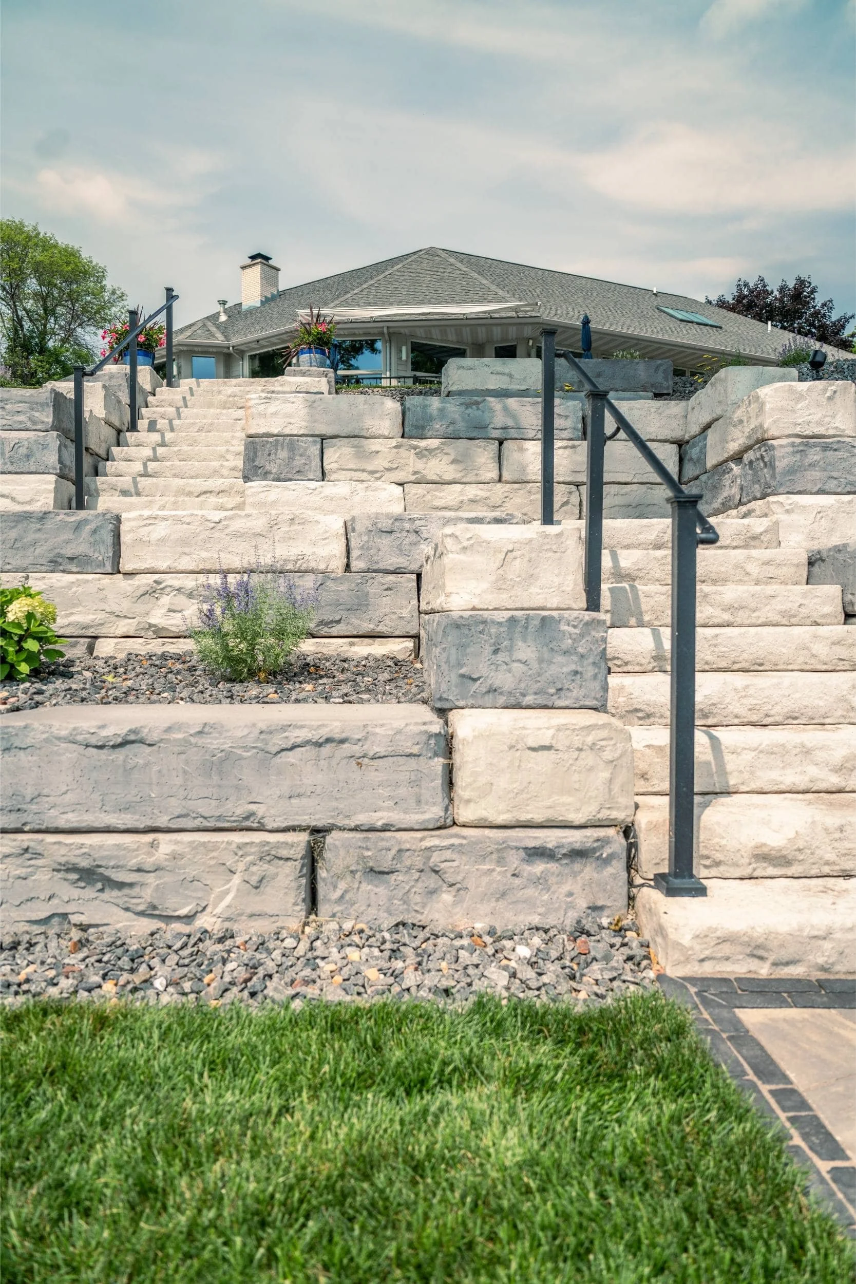 A scenic backyard designed by a trusted deck builder near me in Neenah, WI