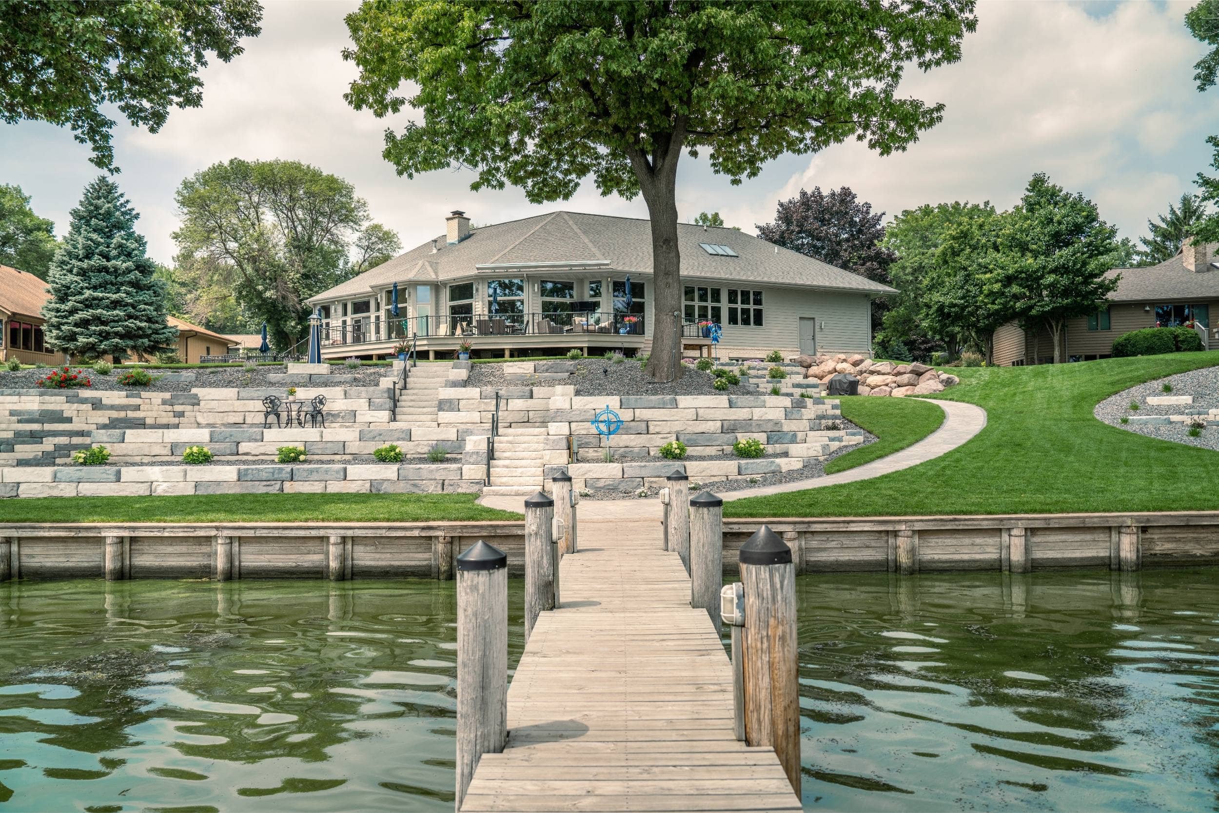 A tranquil shoreline setting enhanced with a fire pit in Green Bay, WI