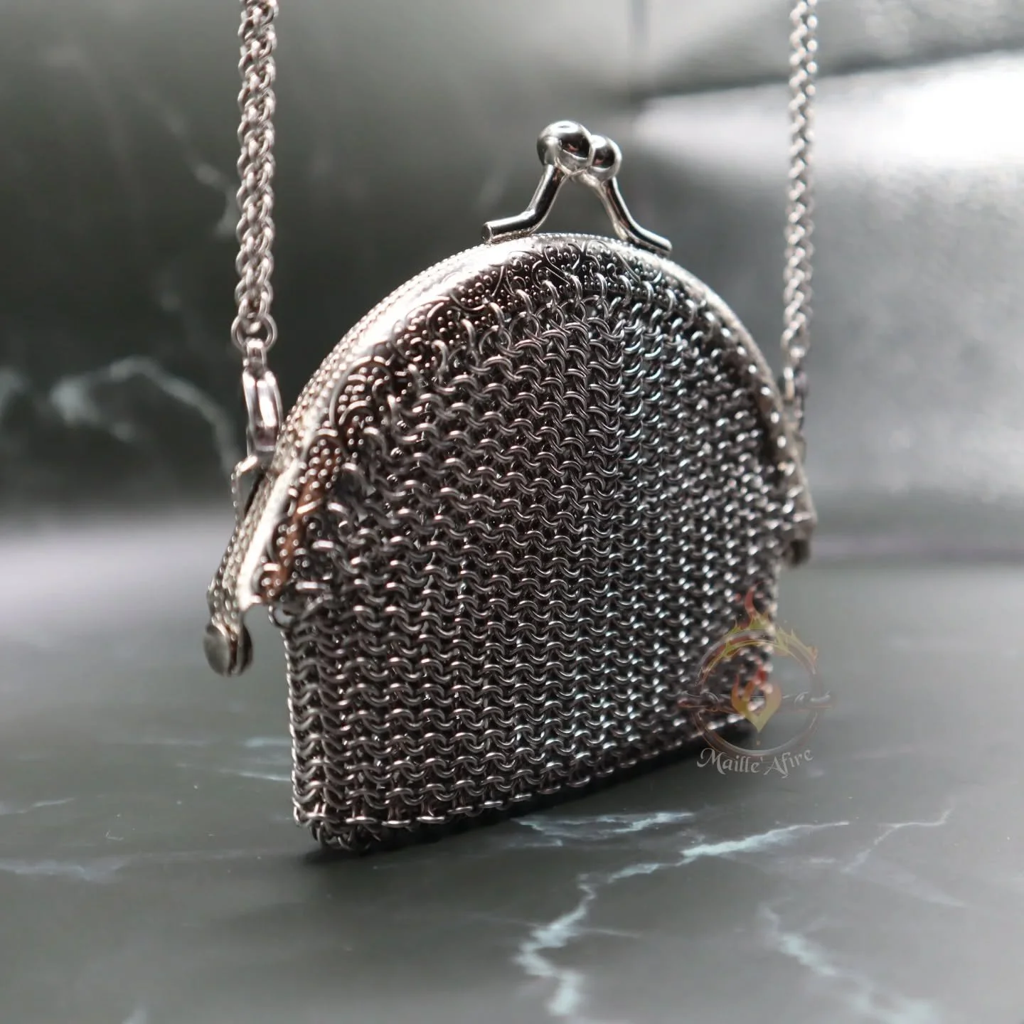 &bull; Coin Purse w/ detachable strap in Stainless Steel &bull;

This project was designed and inspired by the vintage coin purses from the 1920s.

Available @ www.mailleafire.com

#chainmaille #chainmaillefashion #mailleafire